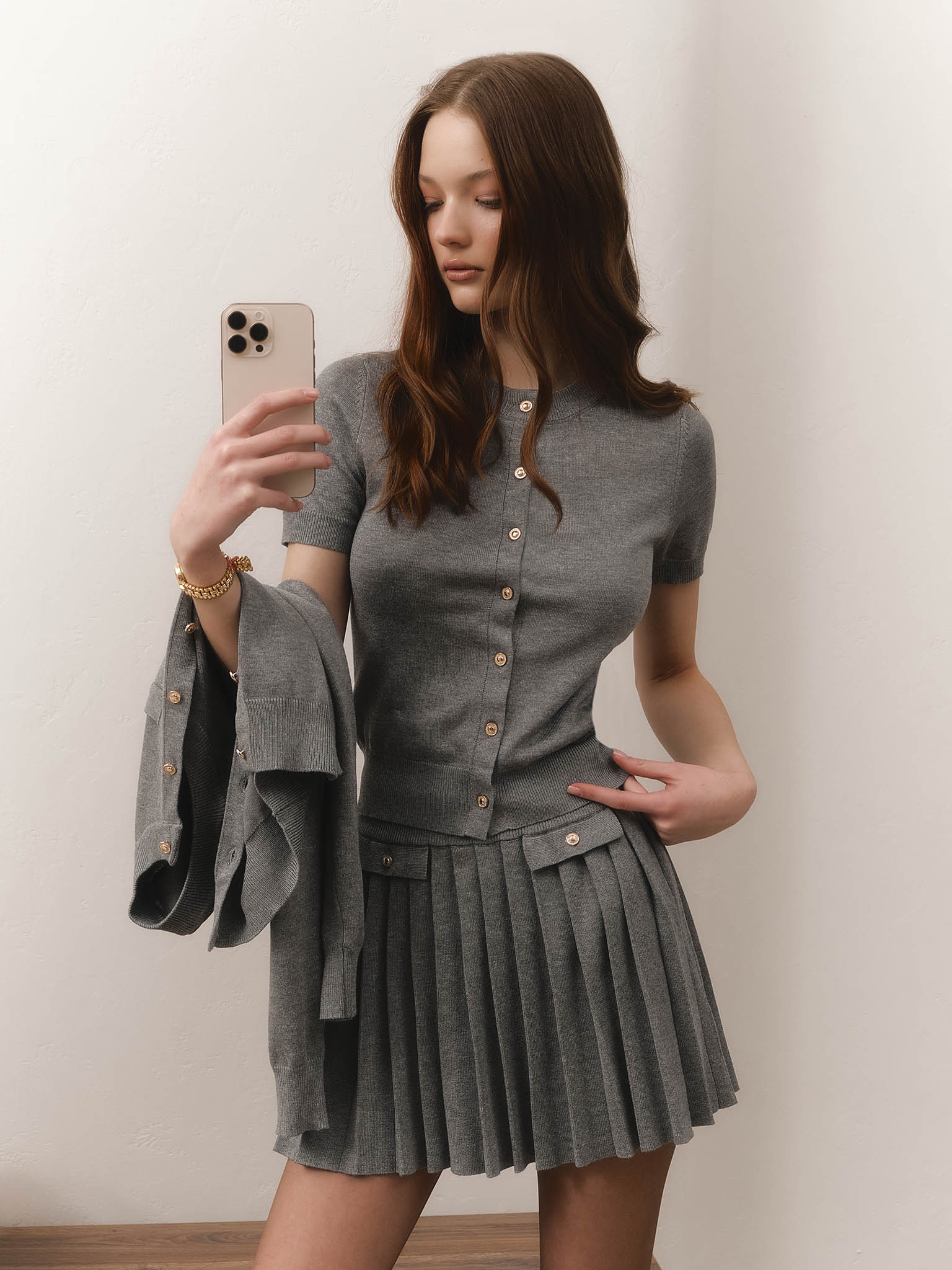 Pleated jersey knit mini skirt