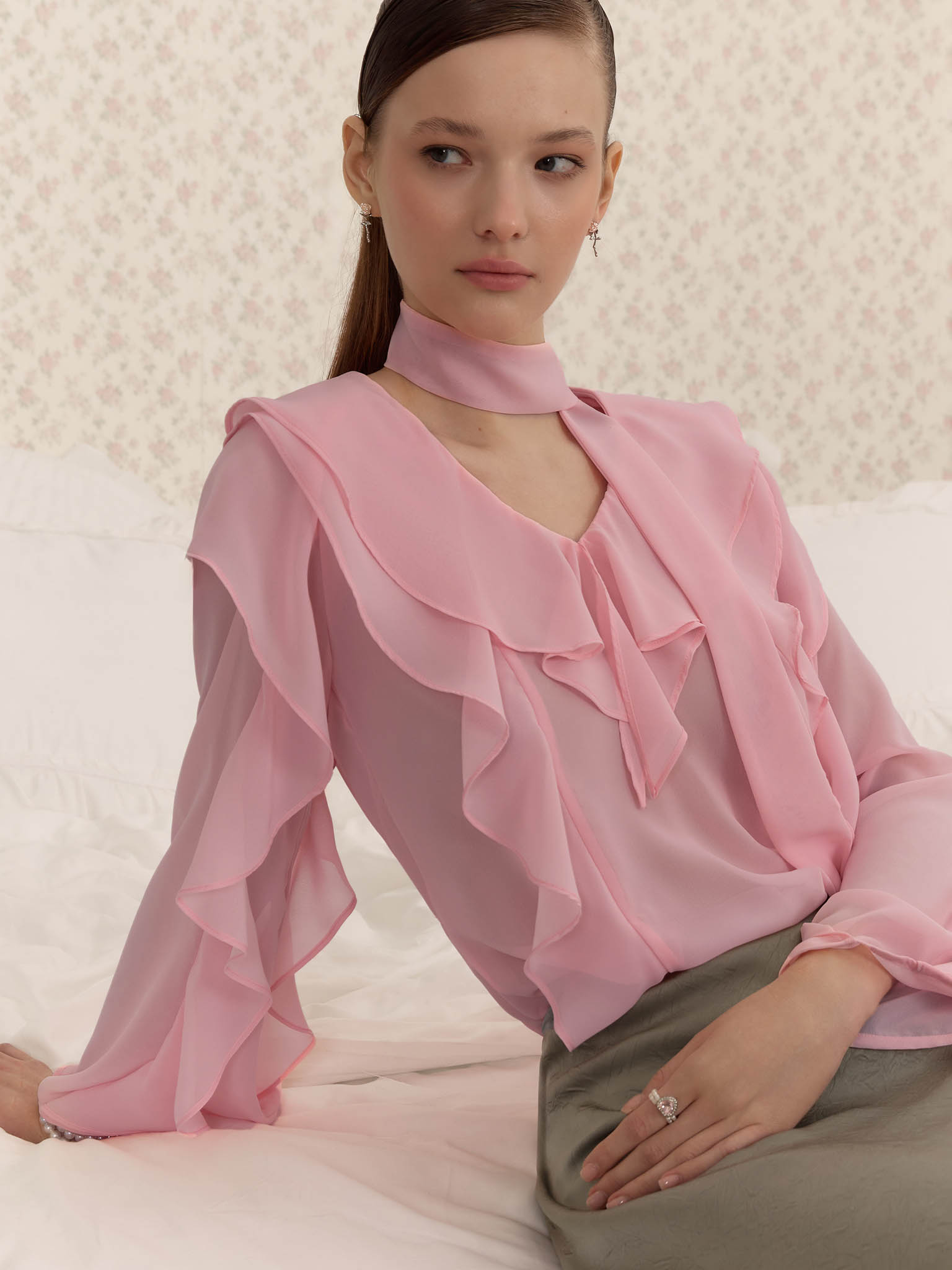 Semi-transparent blouse with flounces and ribbon scarf