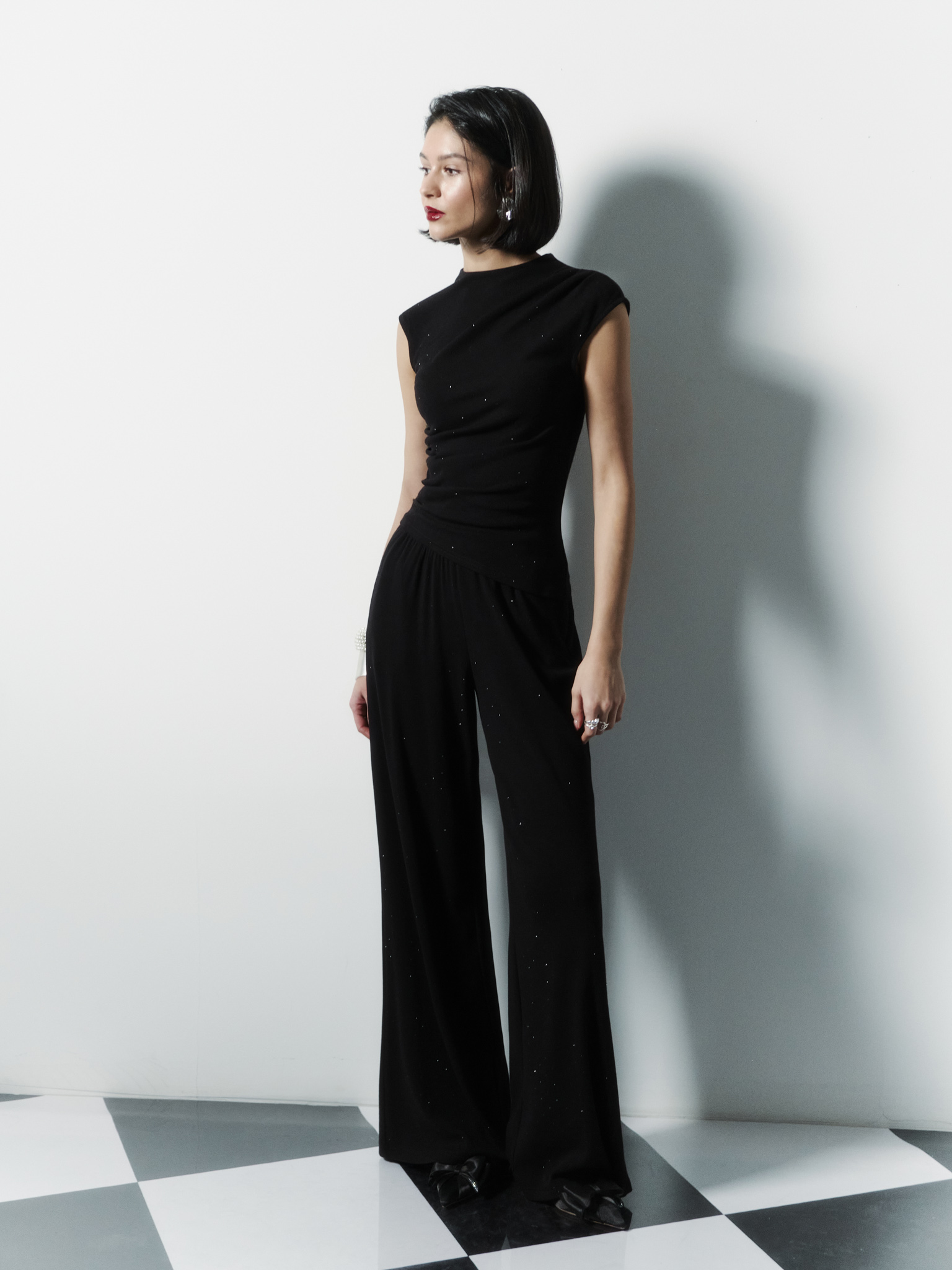 Top en maille avec petites fronces et strass