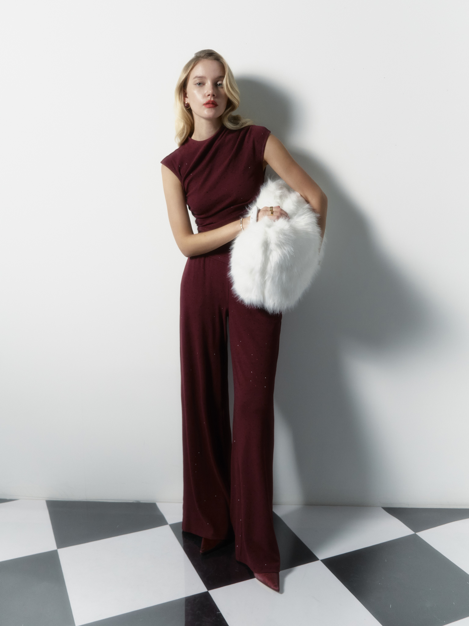 Top en maille avec petites fronces et strass