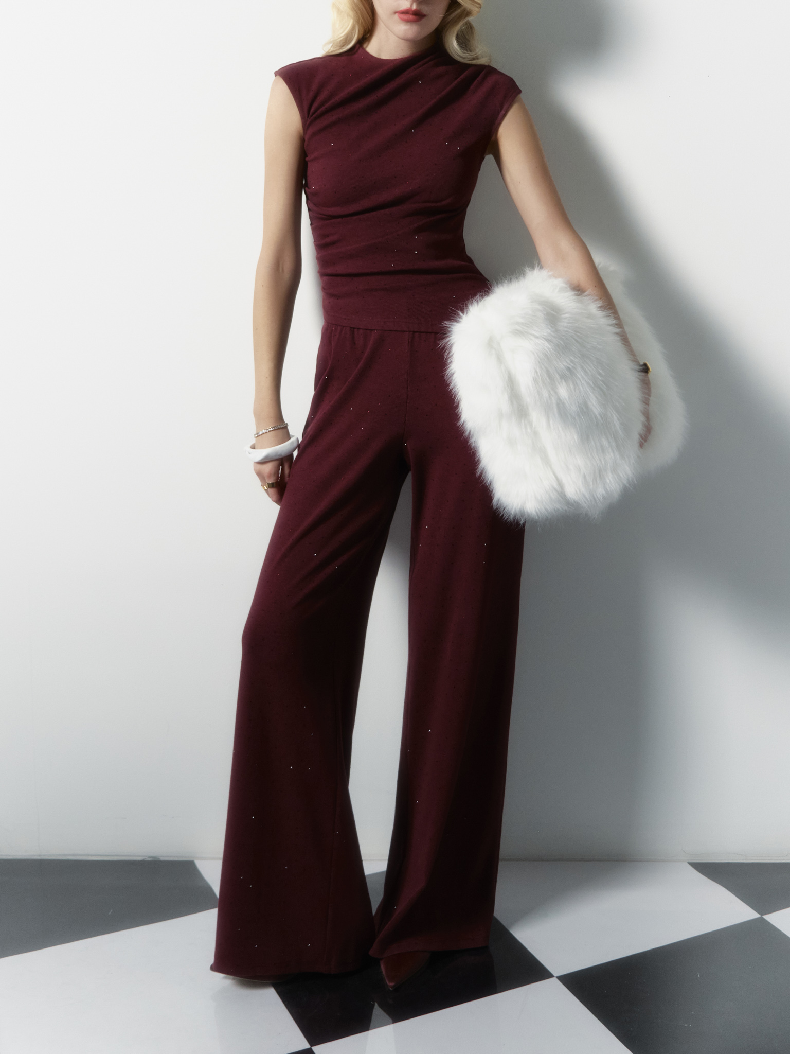 Top en maille avec petites fronces et strass