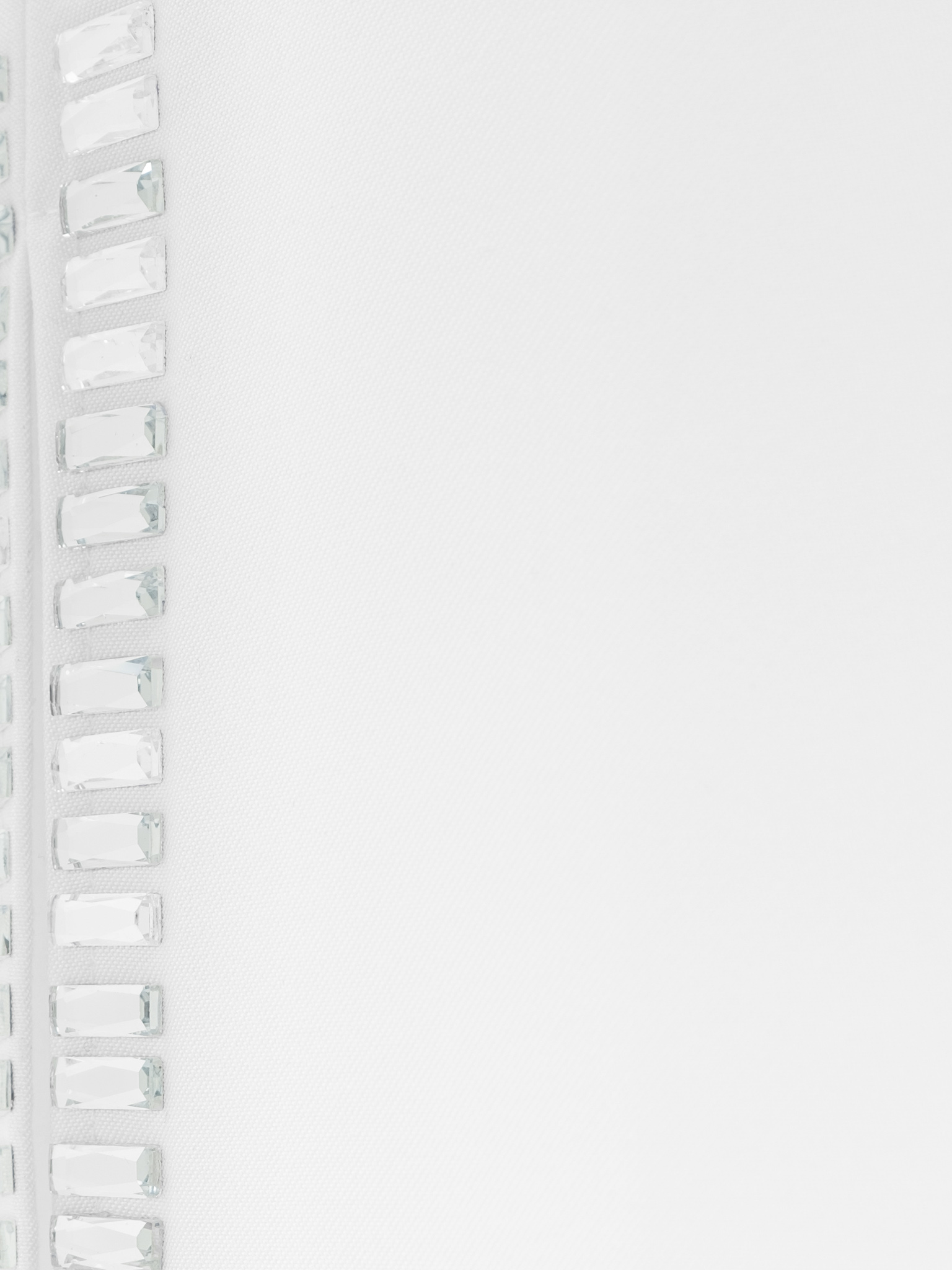 Trousers with slits on the pant legs and silvertone decor