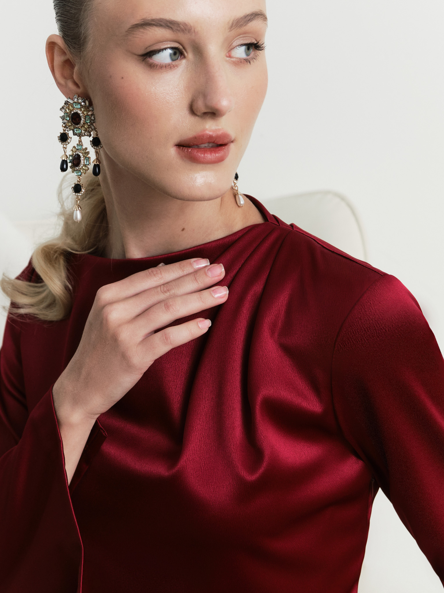 Satin mini A-silhouette dress with draping on the shoulder