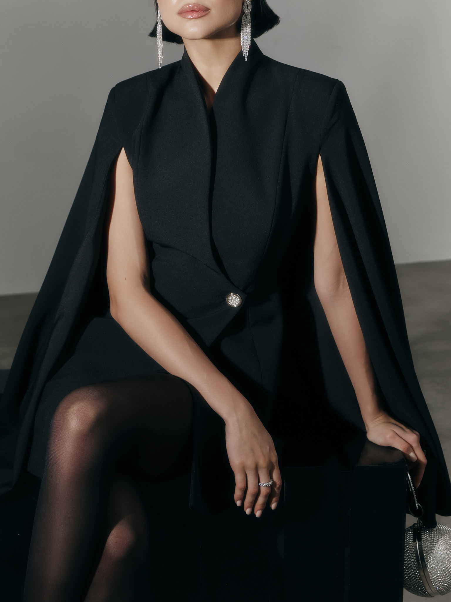 Mini dress in suiting fabric with cape on the shoulders