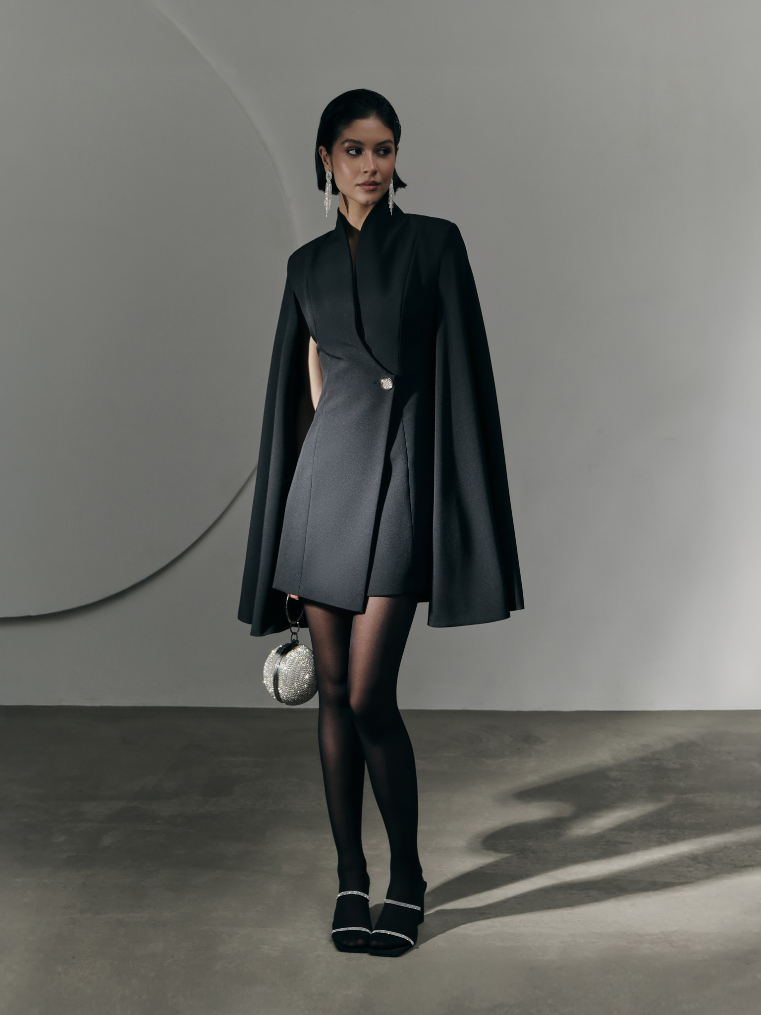 Mini dress in suiting fabric with cape on the shoulders