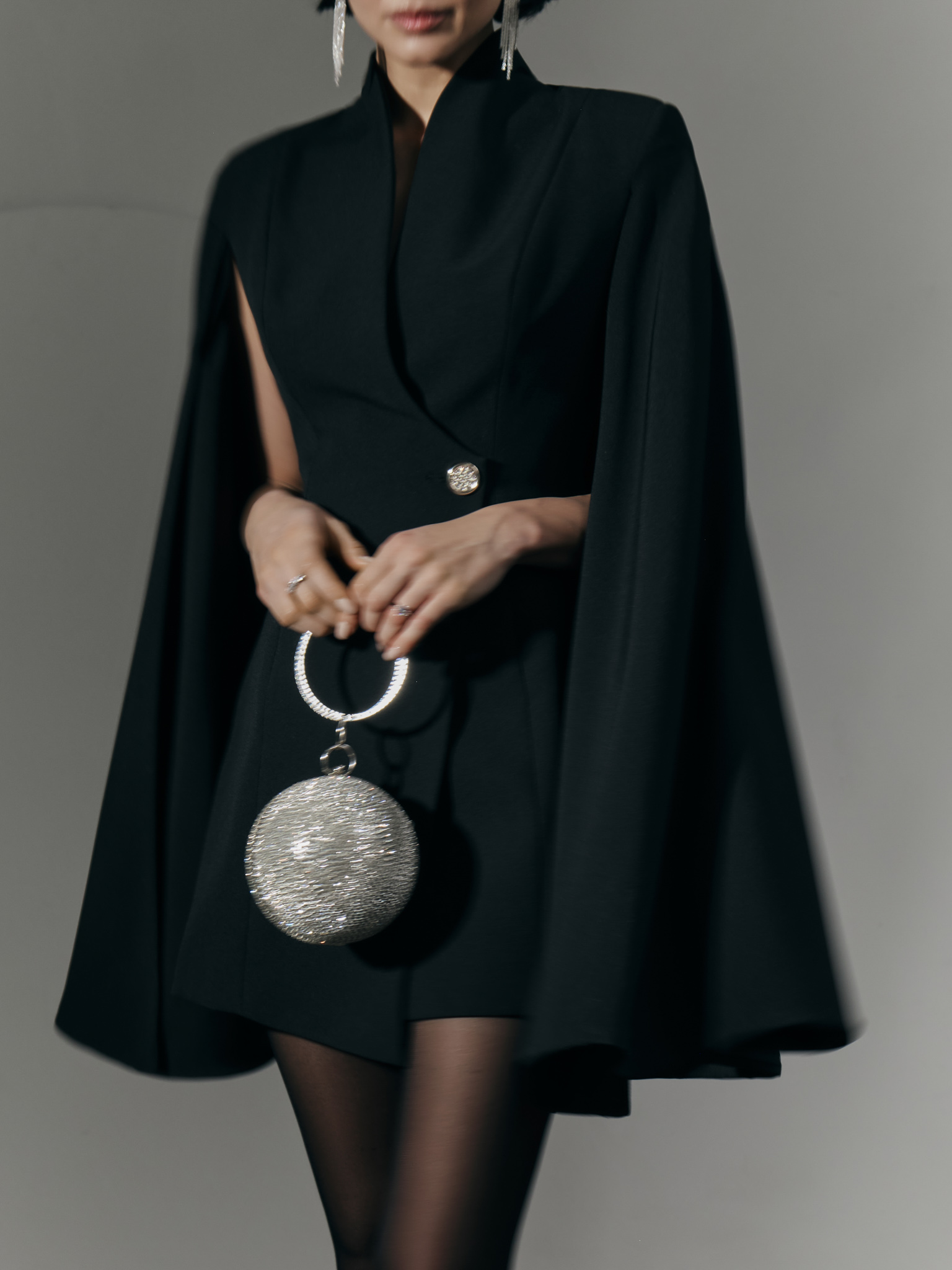 Mini dress in suiting fabric with cape on the shoulders