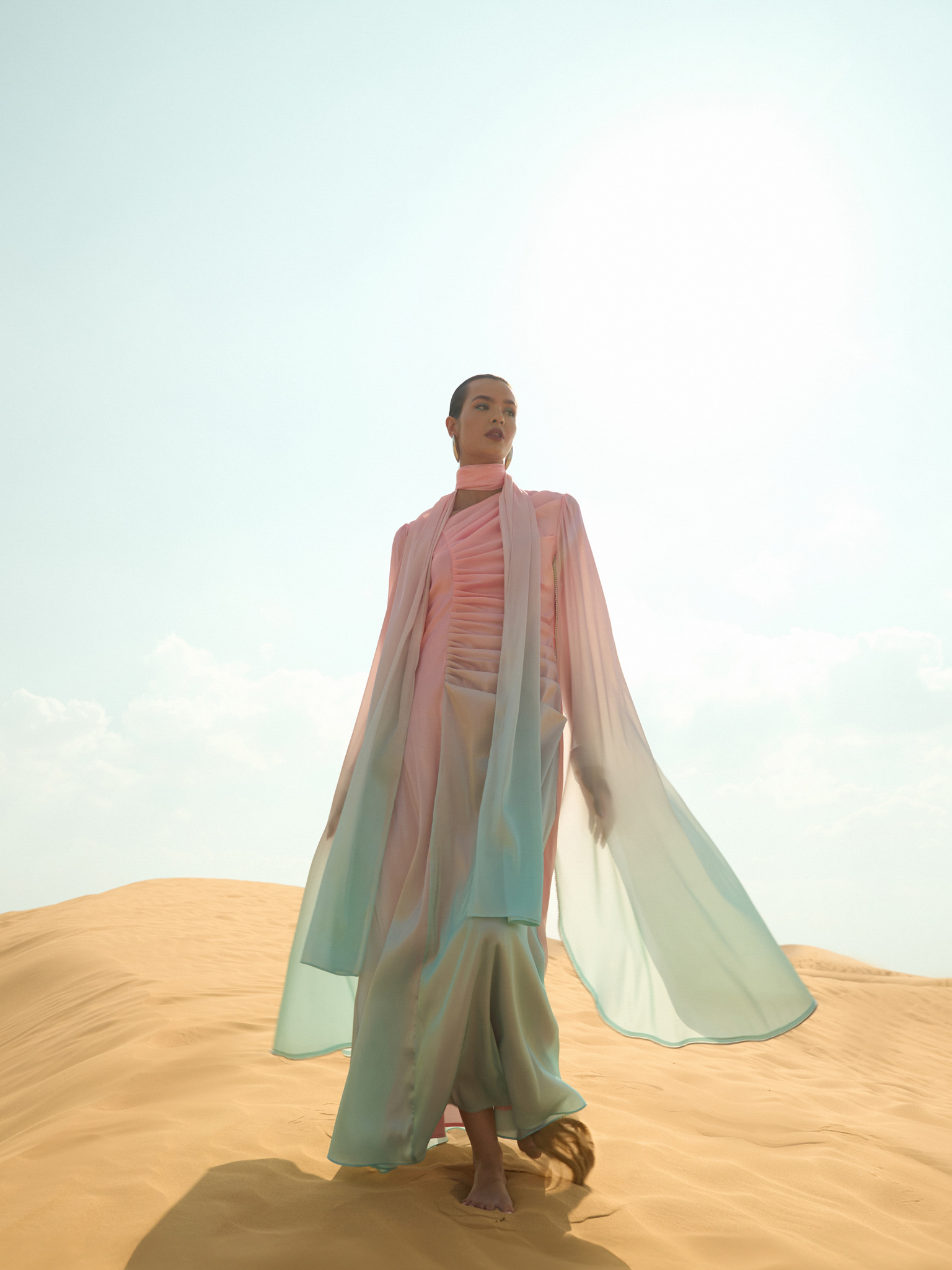 فستان ماكسي بياقة غير متماثلة ومزين بأحجار الراين على الأكمام