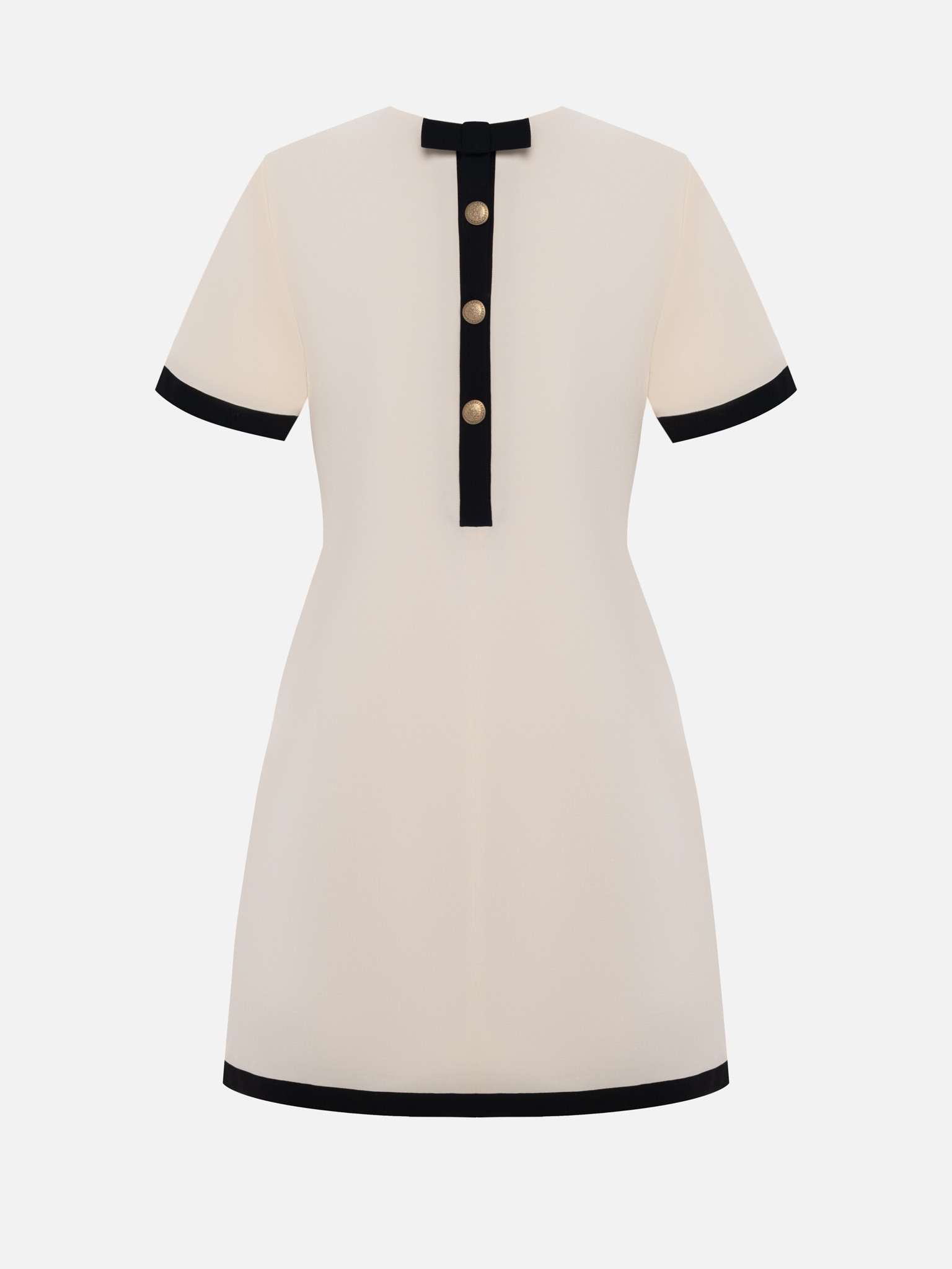 Mini dress with contrasting details and back decoration