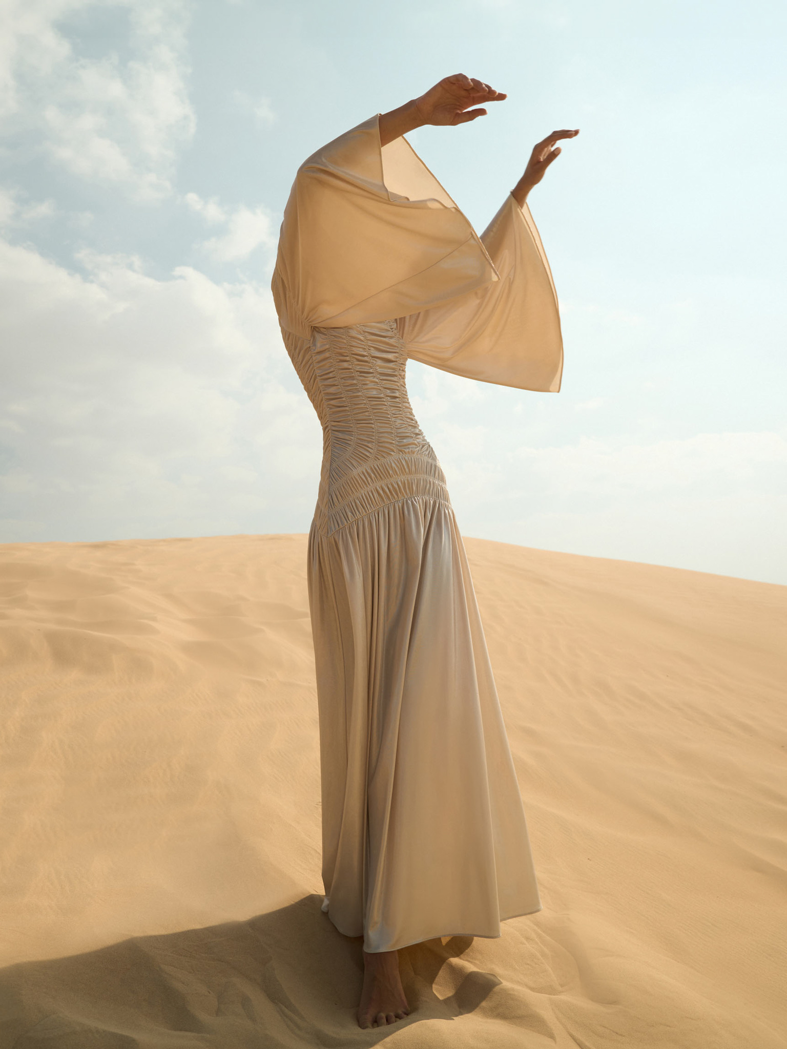 Metallic maxi dress with gathers on the bodice and shoulders