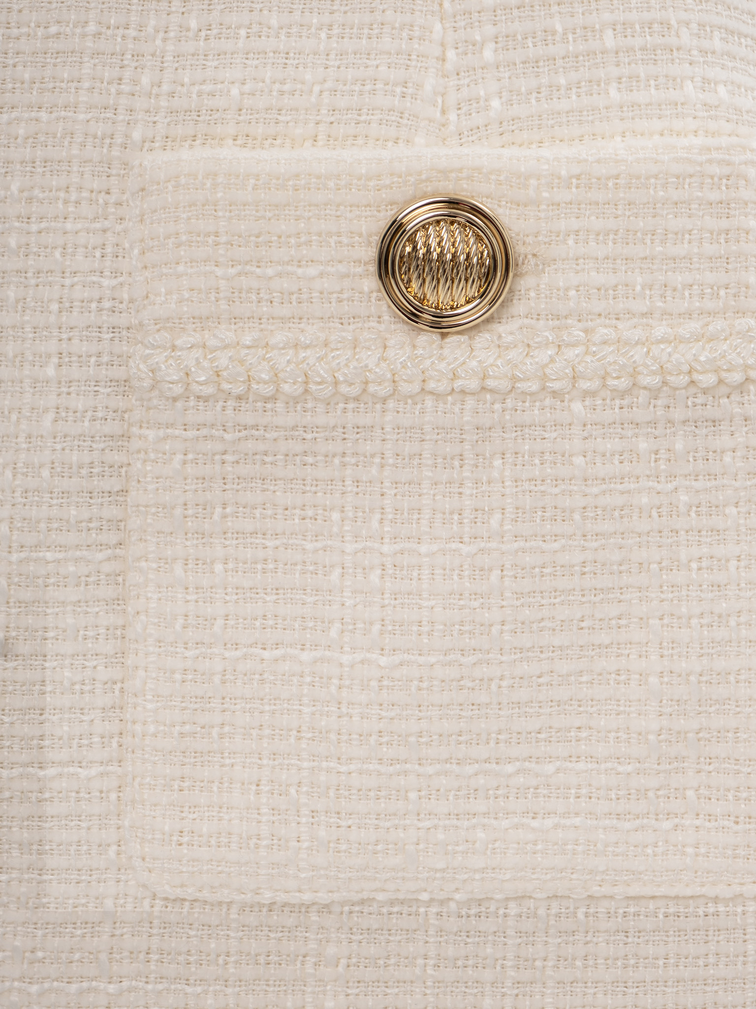 Mini A-silhouette tweed skort with large buttons