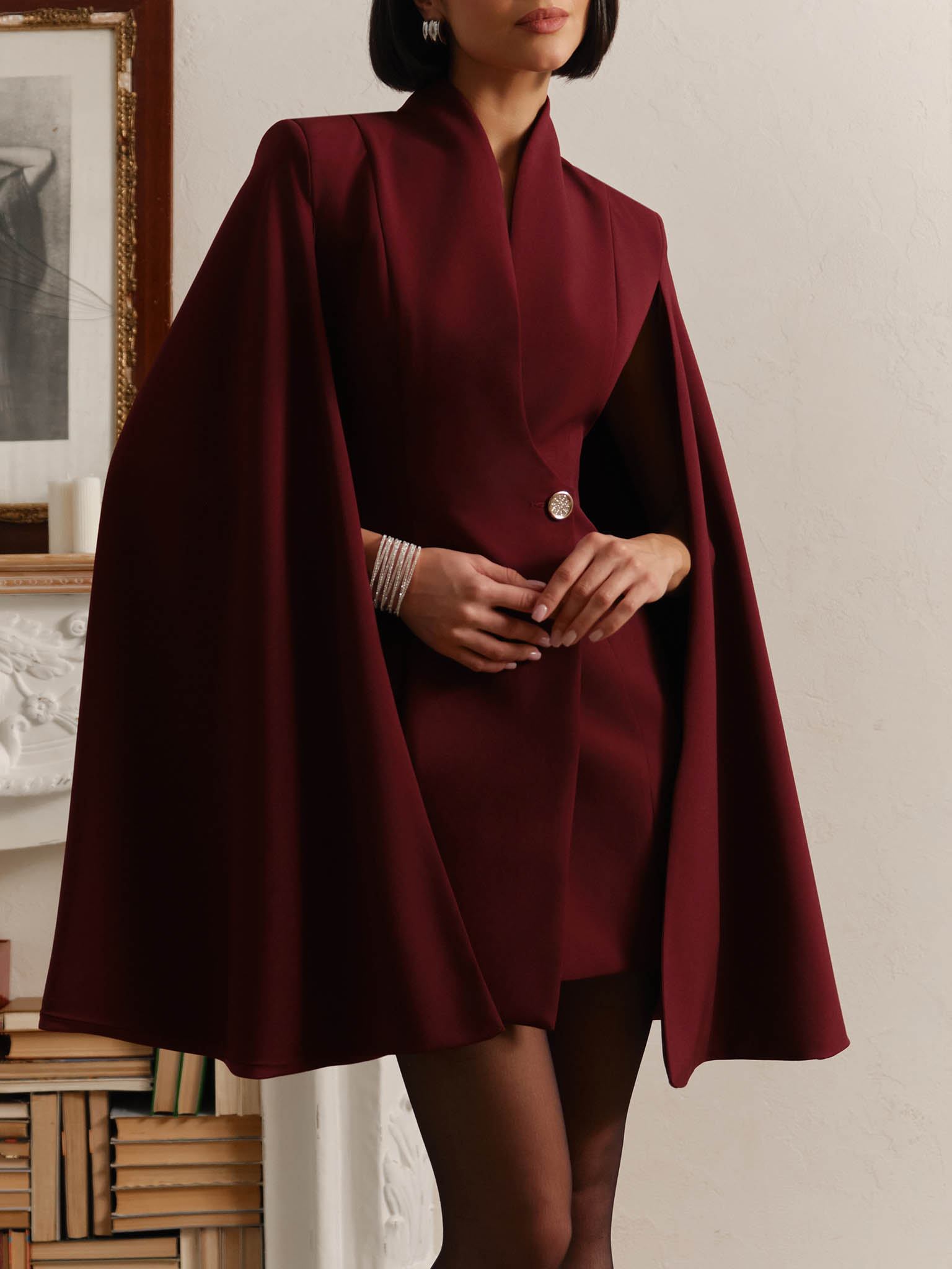 Mini dress in suiting fabric with cape on the shoulders