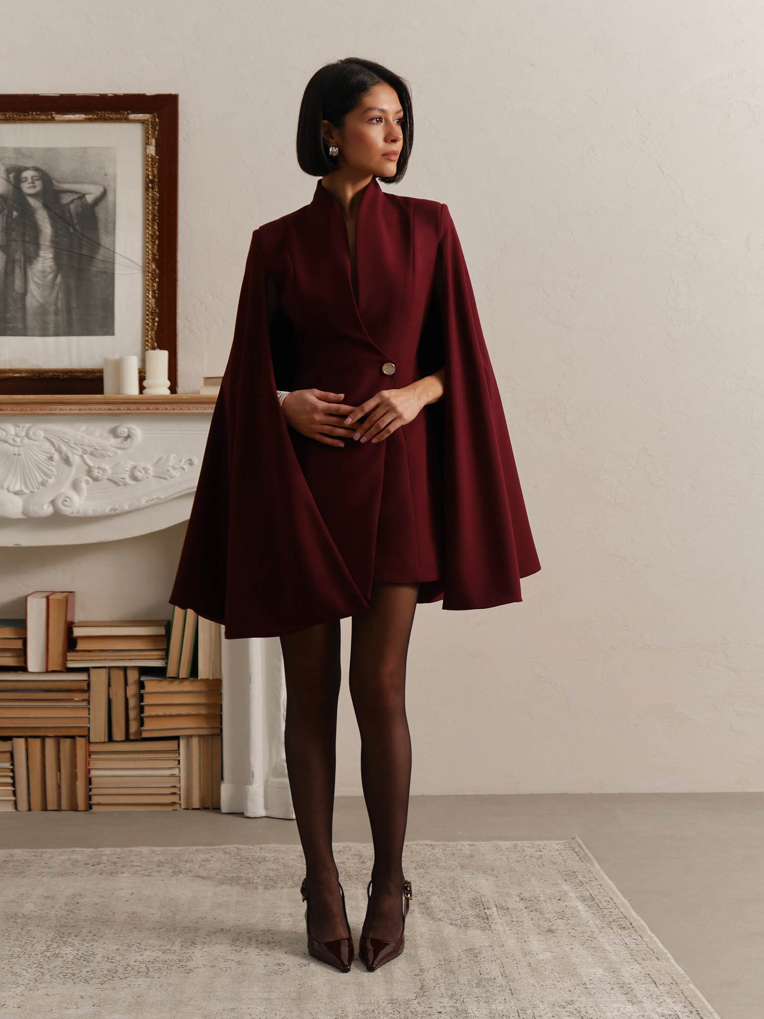 Mini dress in suiting fabric with cape on the shoulders
