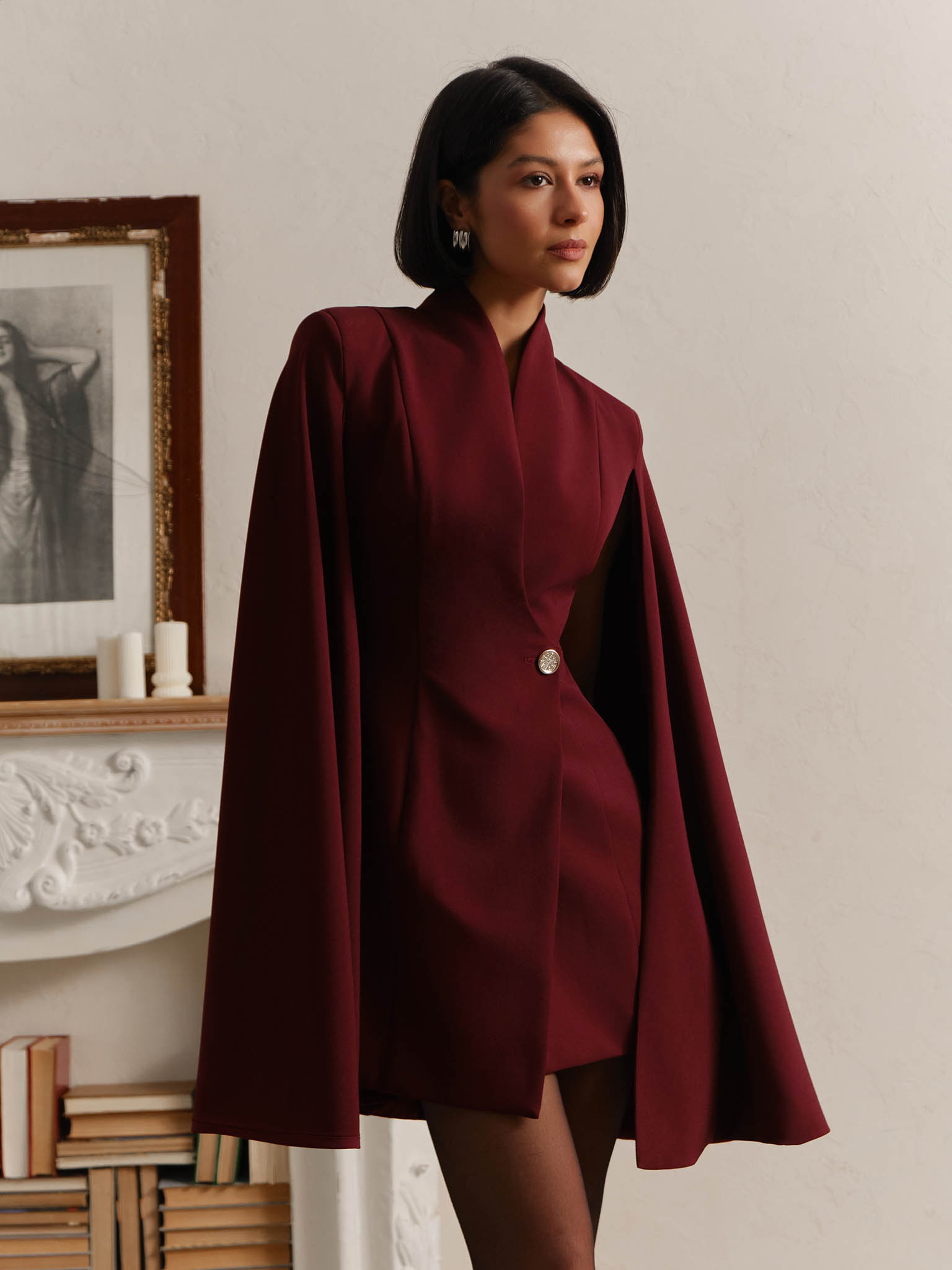 Mini dress in suiting fabric with cape on the shoulders