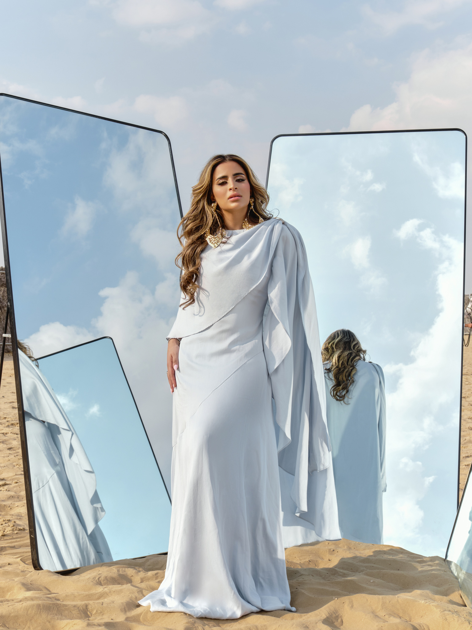 Maxi dress with asymmetrical cape