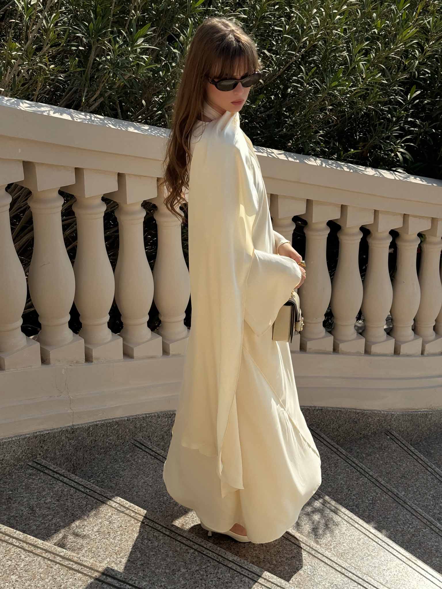 Maxi dress with asymmetrical draped bodice