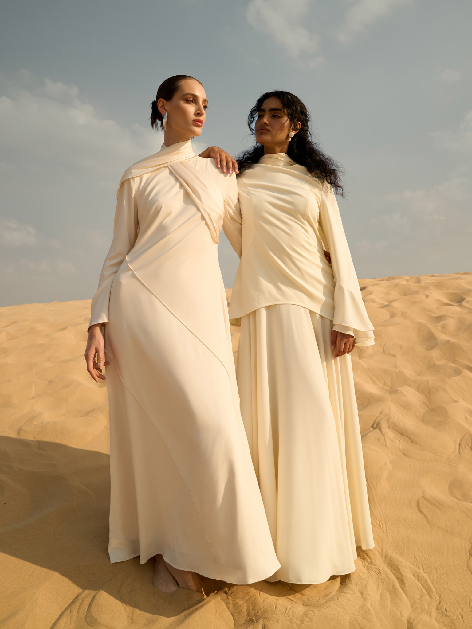 Maxi dress with asymmetrical draped bodice