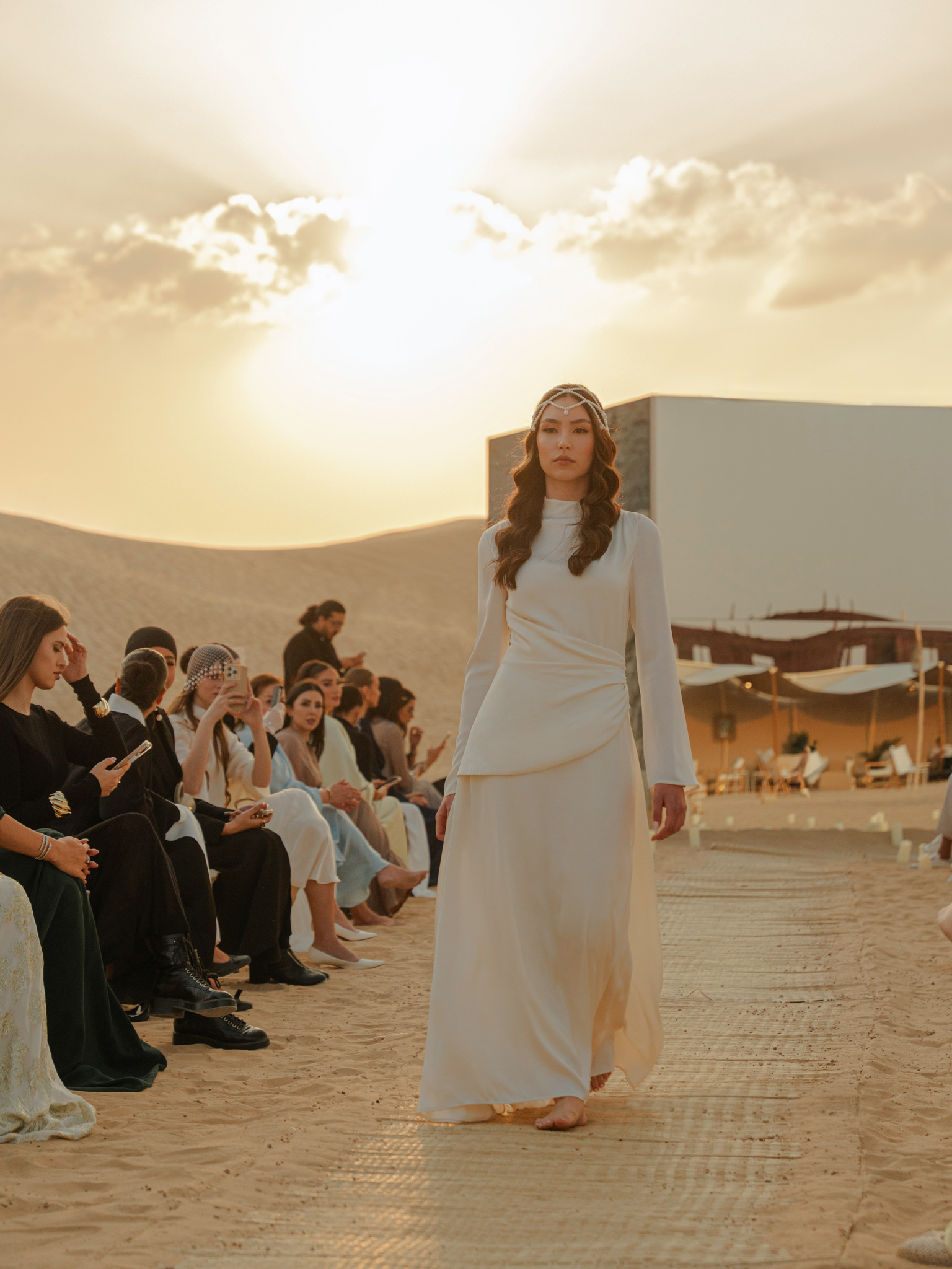 Long sleeved maxi dress with draping at the waist