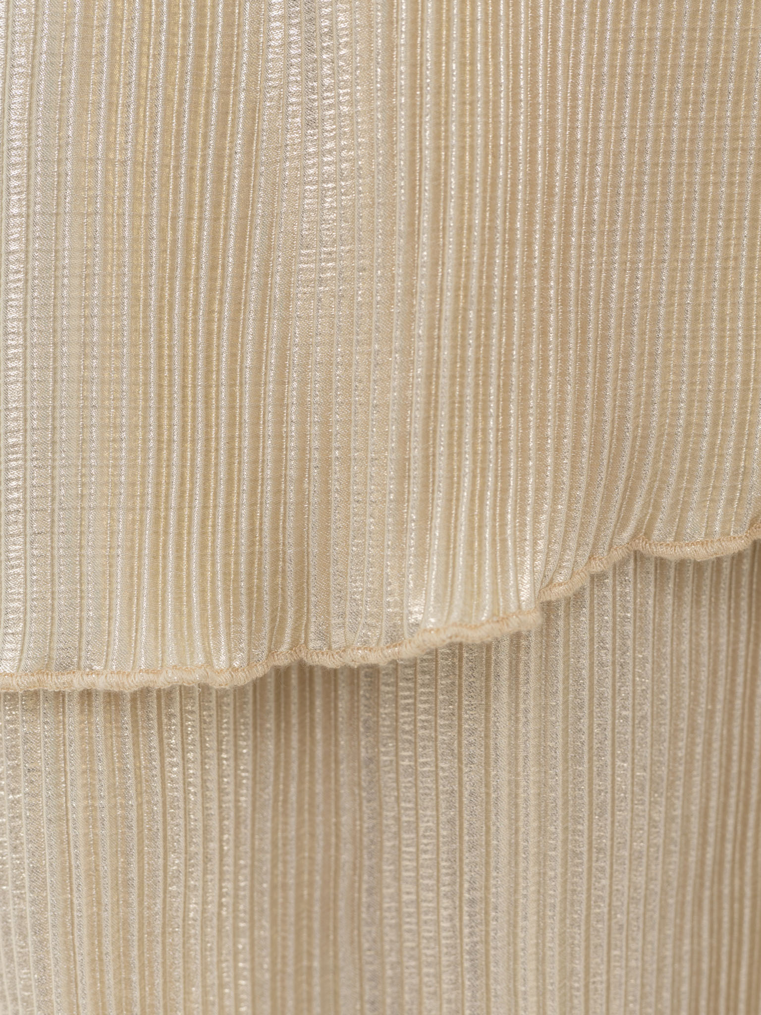 Pleated maxi dress with layered skirt and rhinestone decor at the waist