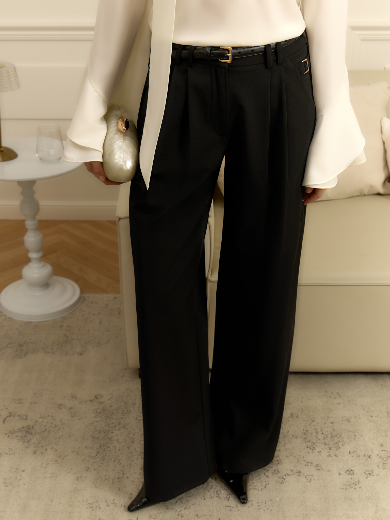 Loose suiting trousers with eco-leather belt