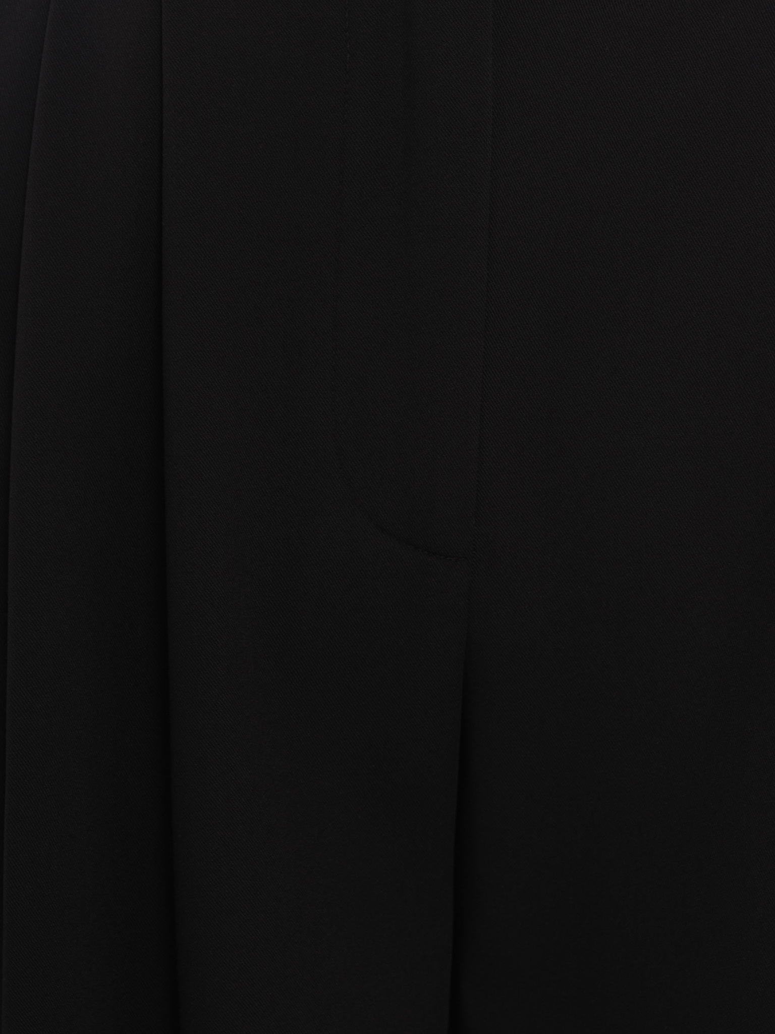 Loose suiting trousers with eco-leather belt