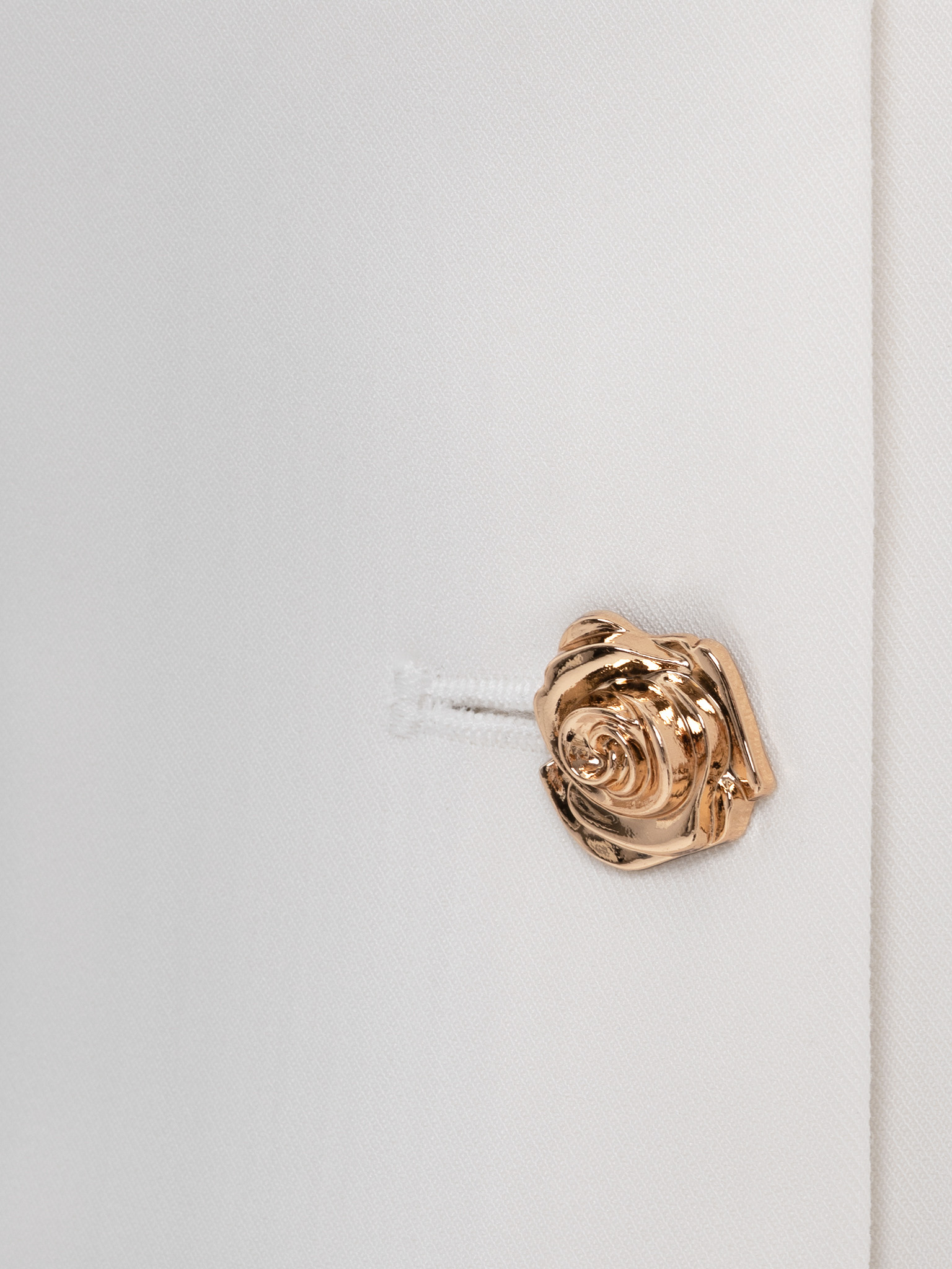 Flared waistcoat with flower buttons