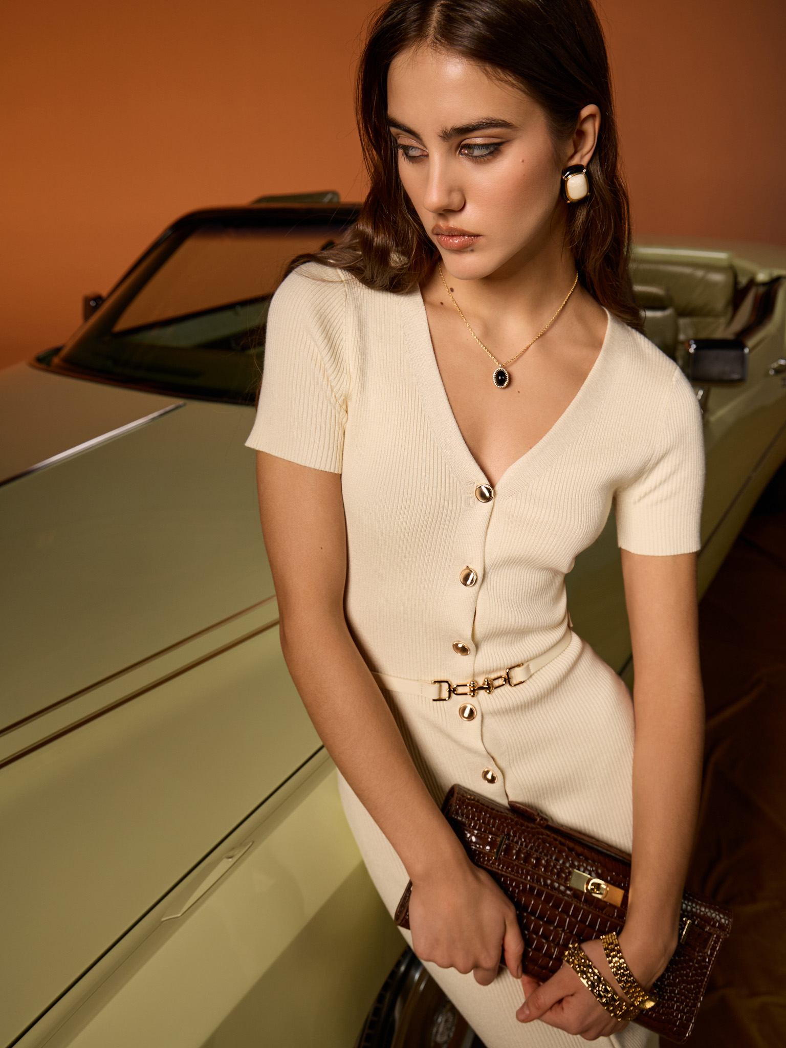 Knitted midi dress with buttons at the front and matching belt