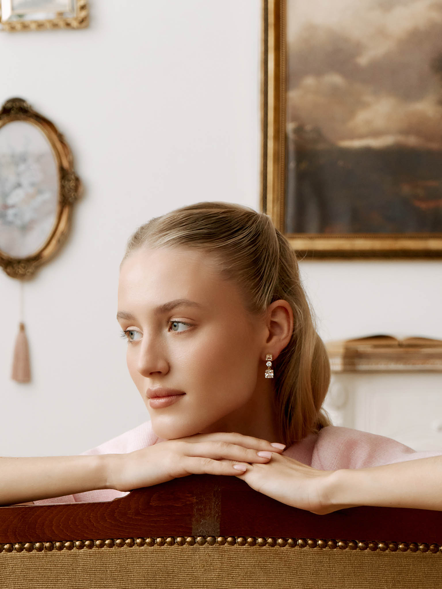 Goldentone earrings with square stones