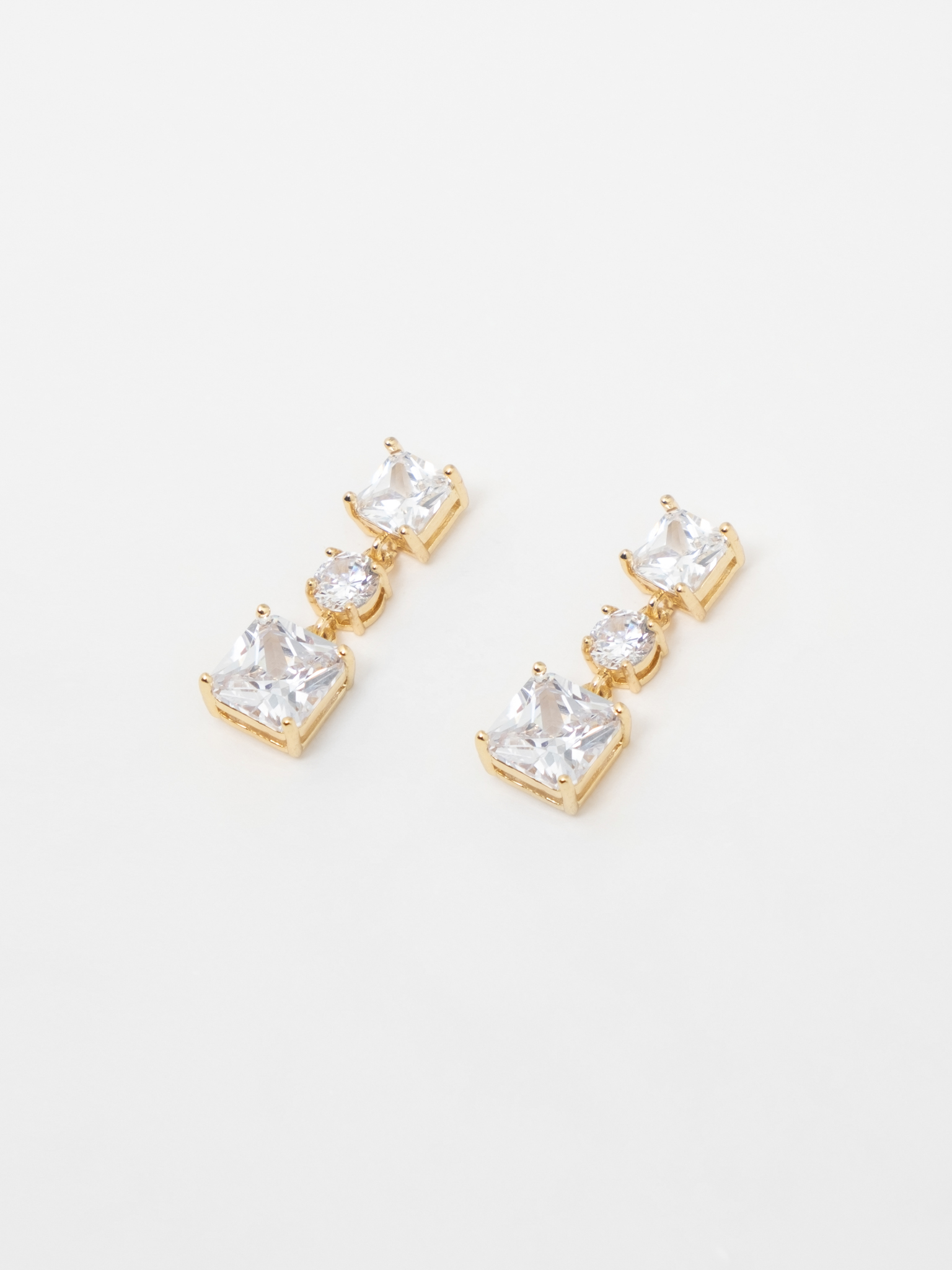 Goldentone earrings with square stones