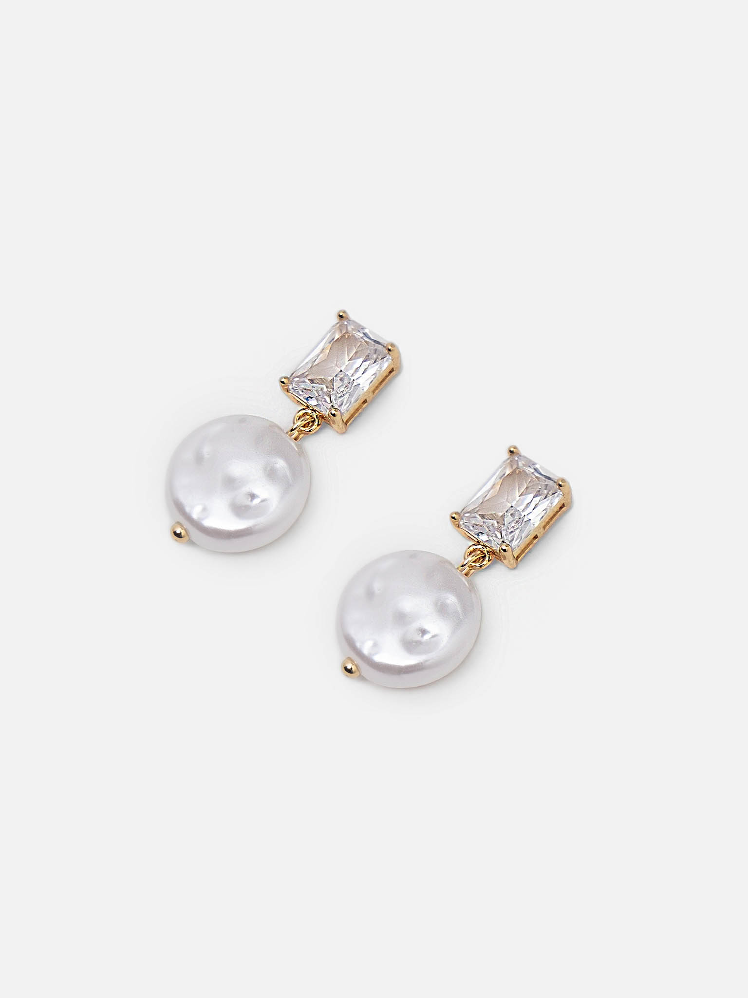 Stud earrings with large stones and pearls