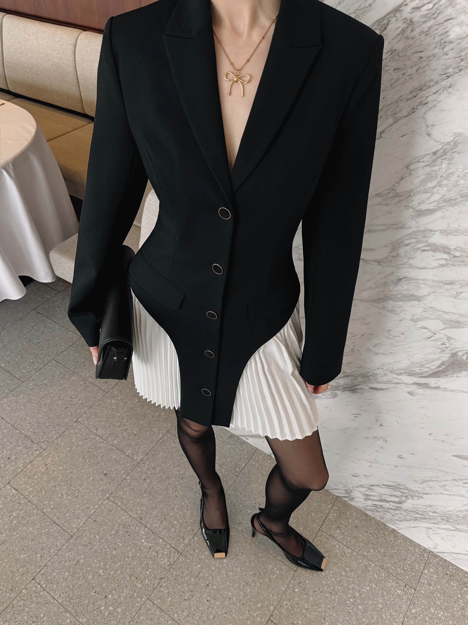 Mini blazer dress with pleated inserts on the skirt