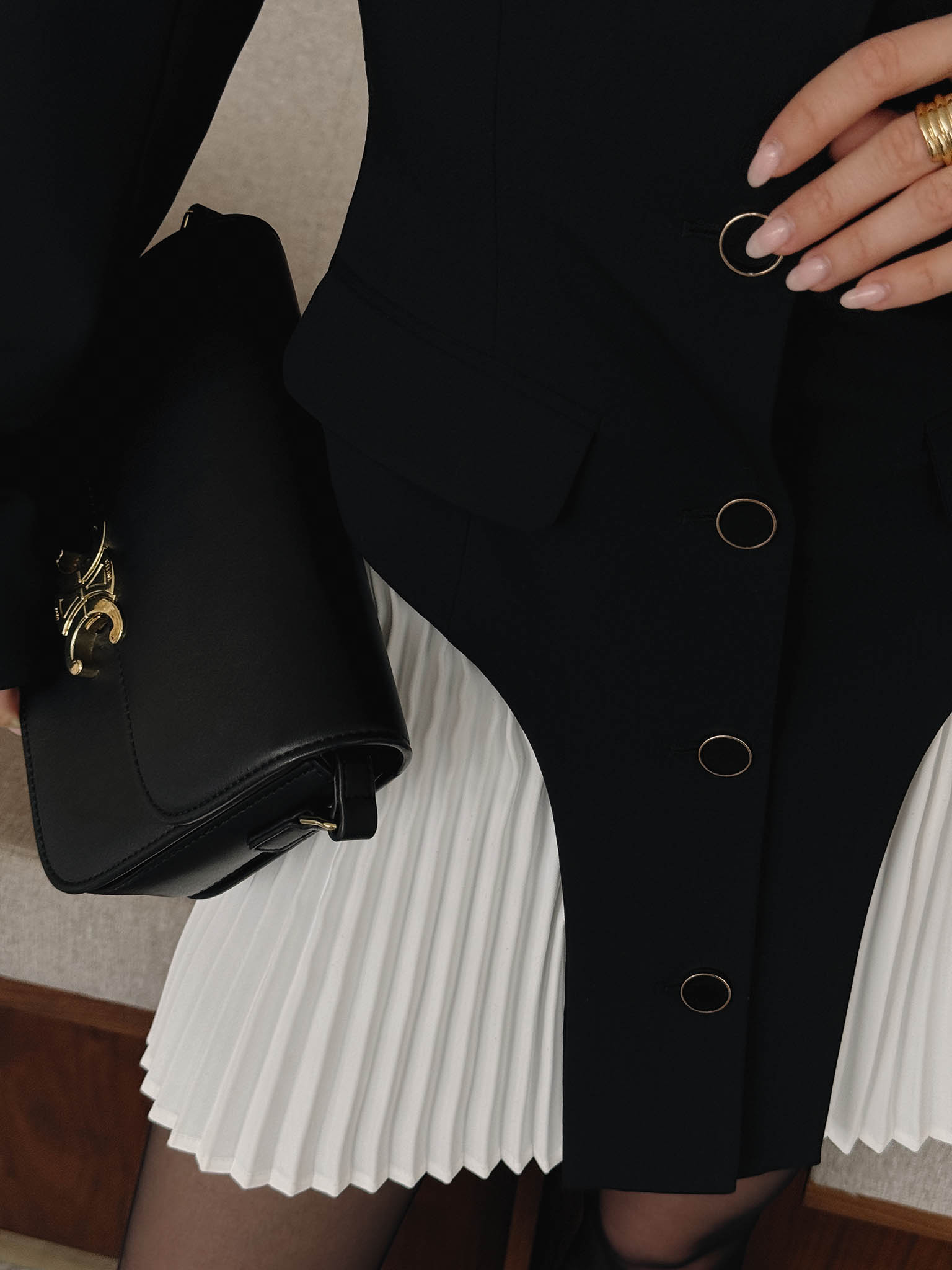 Mini blazer dress with pleated inserts on the skirt