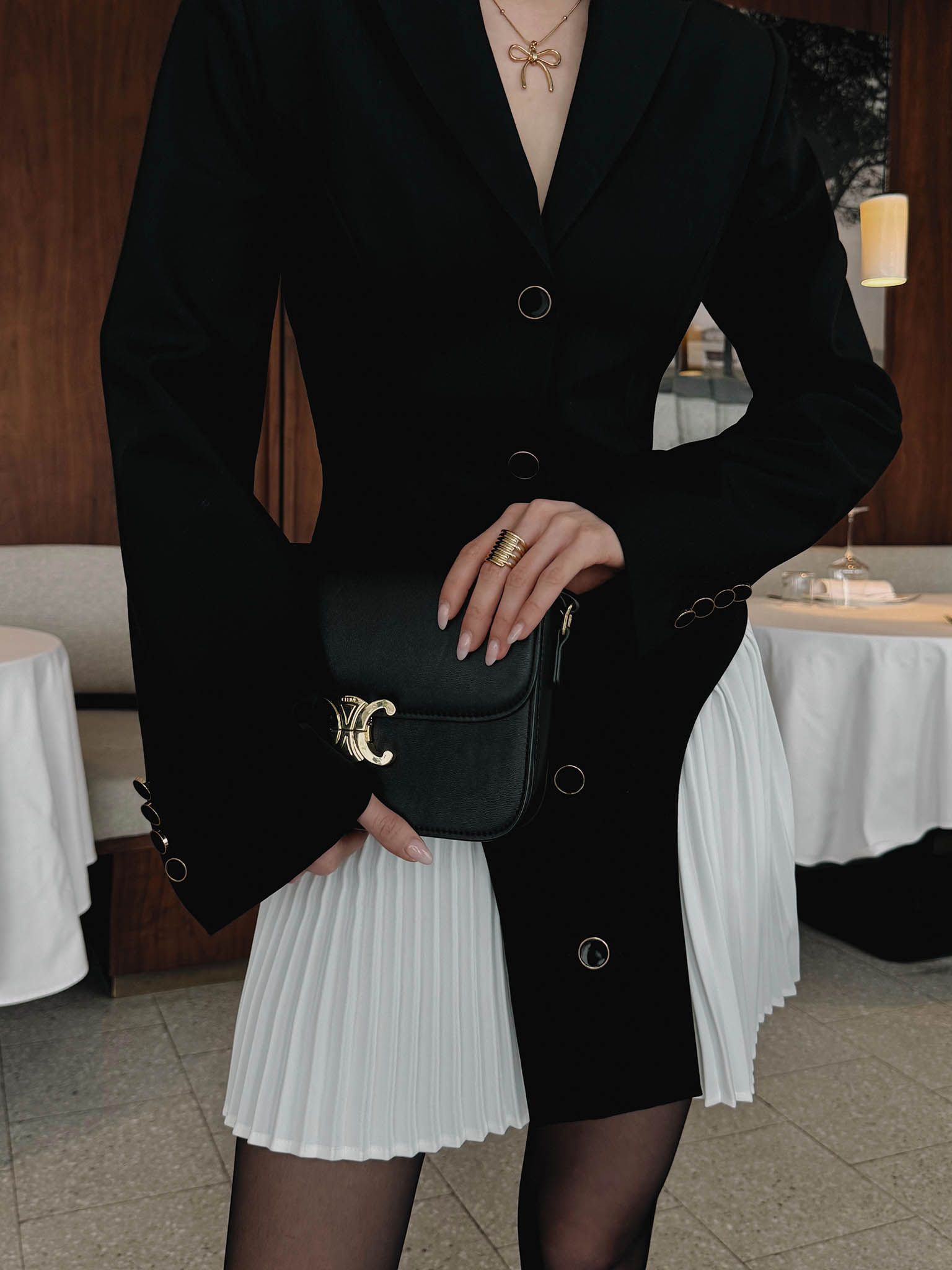 Mini blazer dress with pleated inserts on the skirt