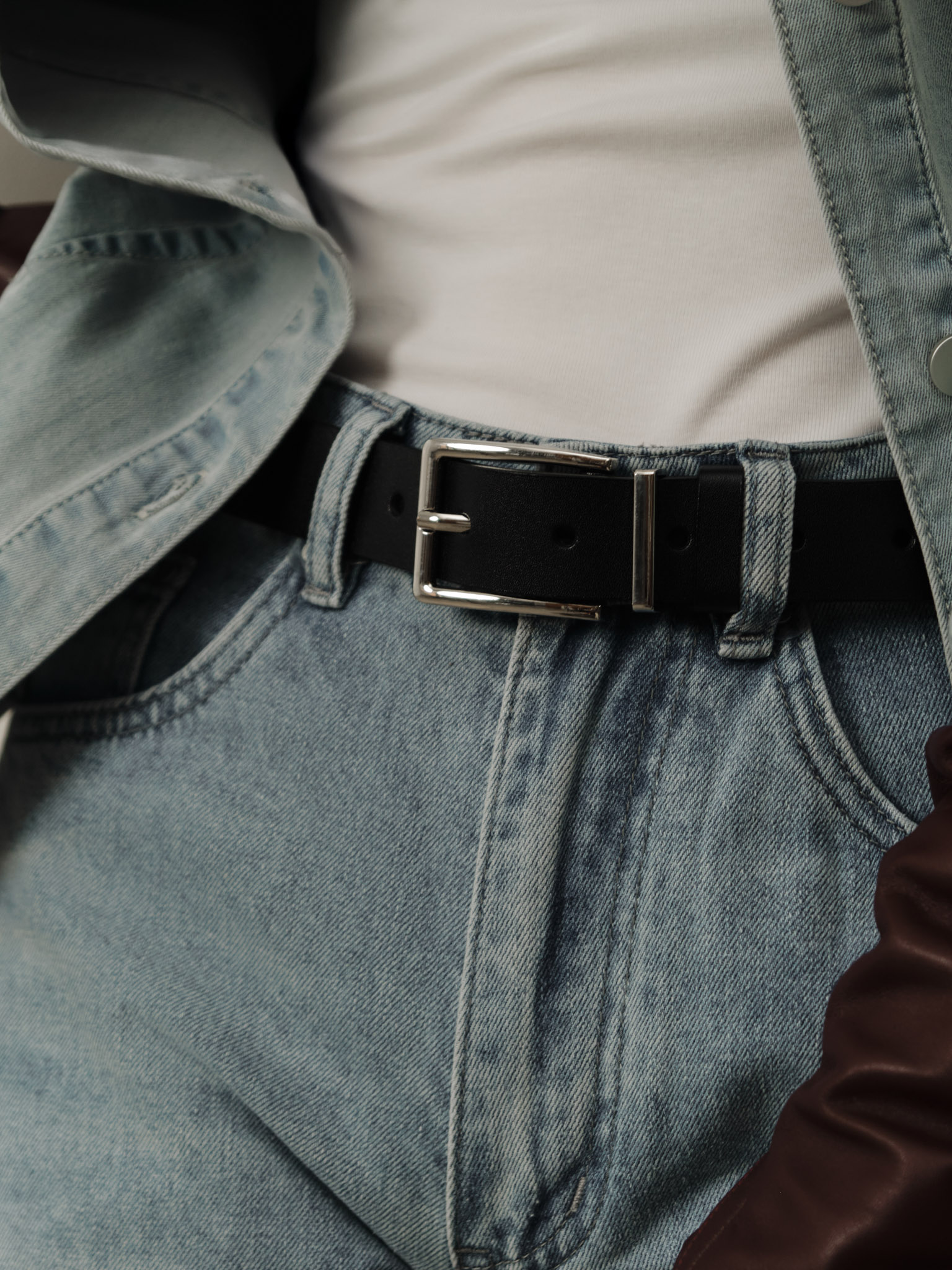 Leather belt with a thin buckle