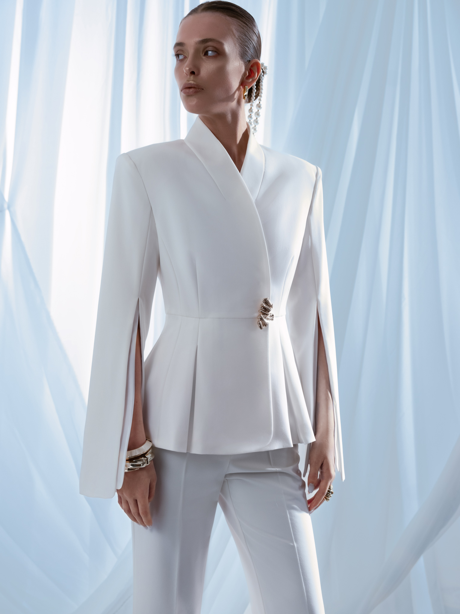 Flared jacket with slits on sleeves