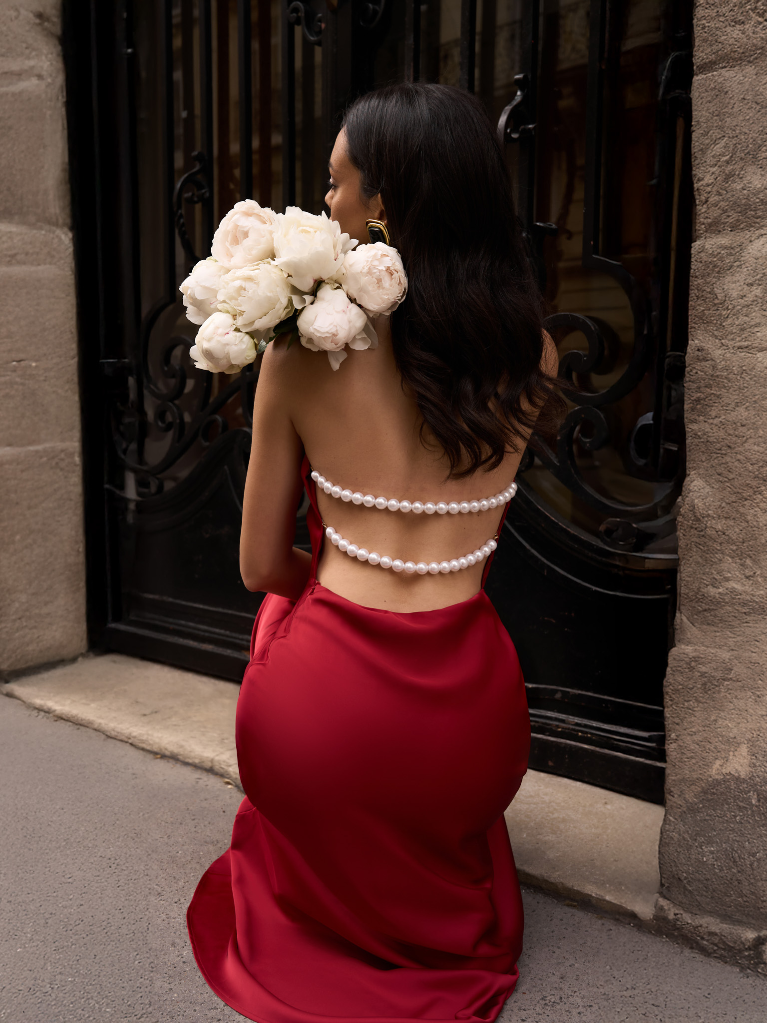 Satin maxi dress with pearl decor on the back