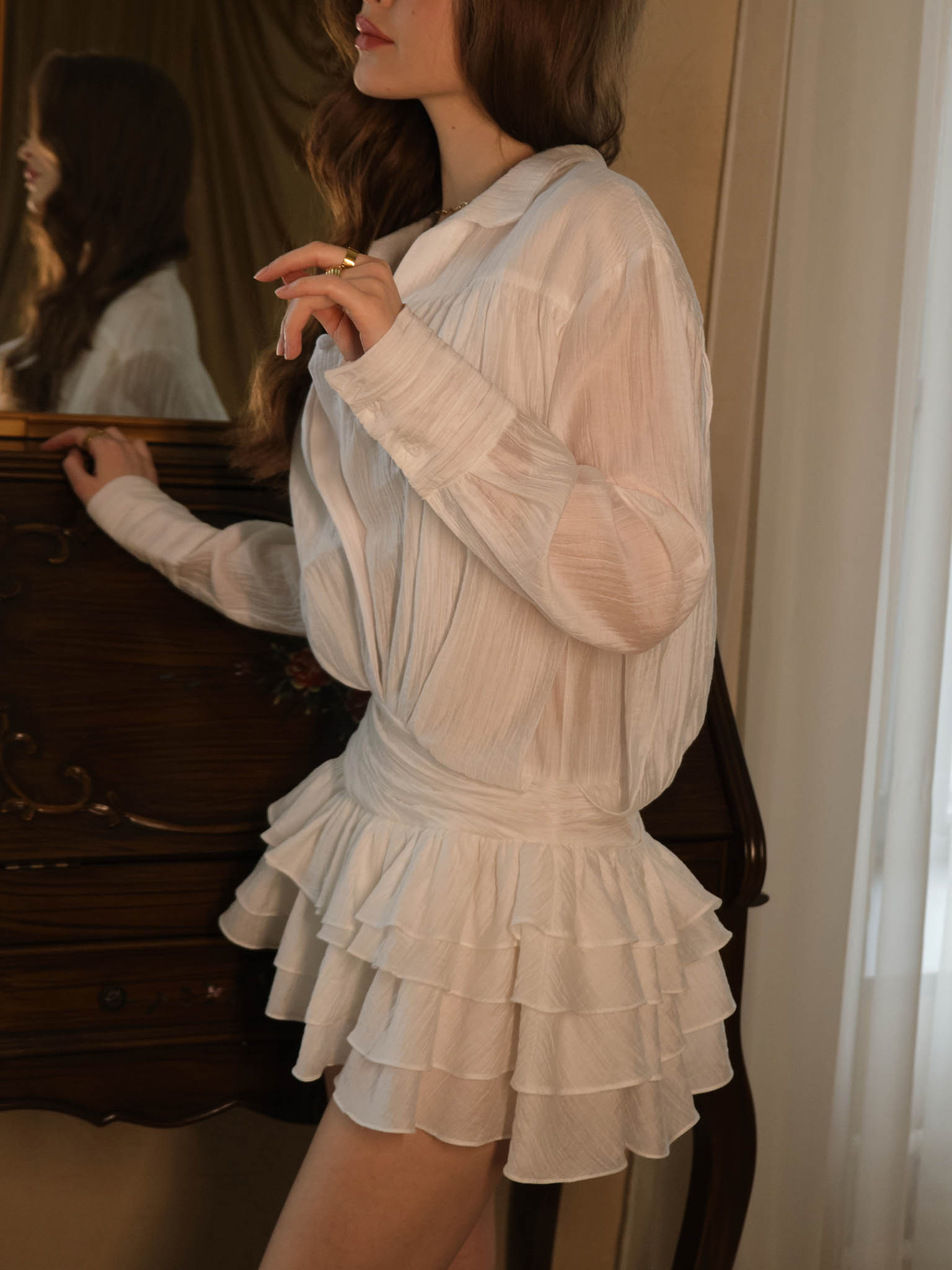 Voluminous textured mini dress with skirt ruffles