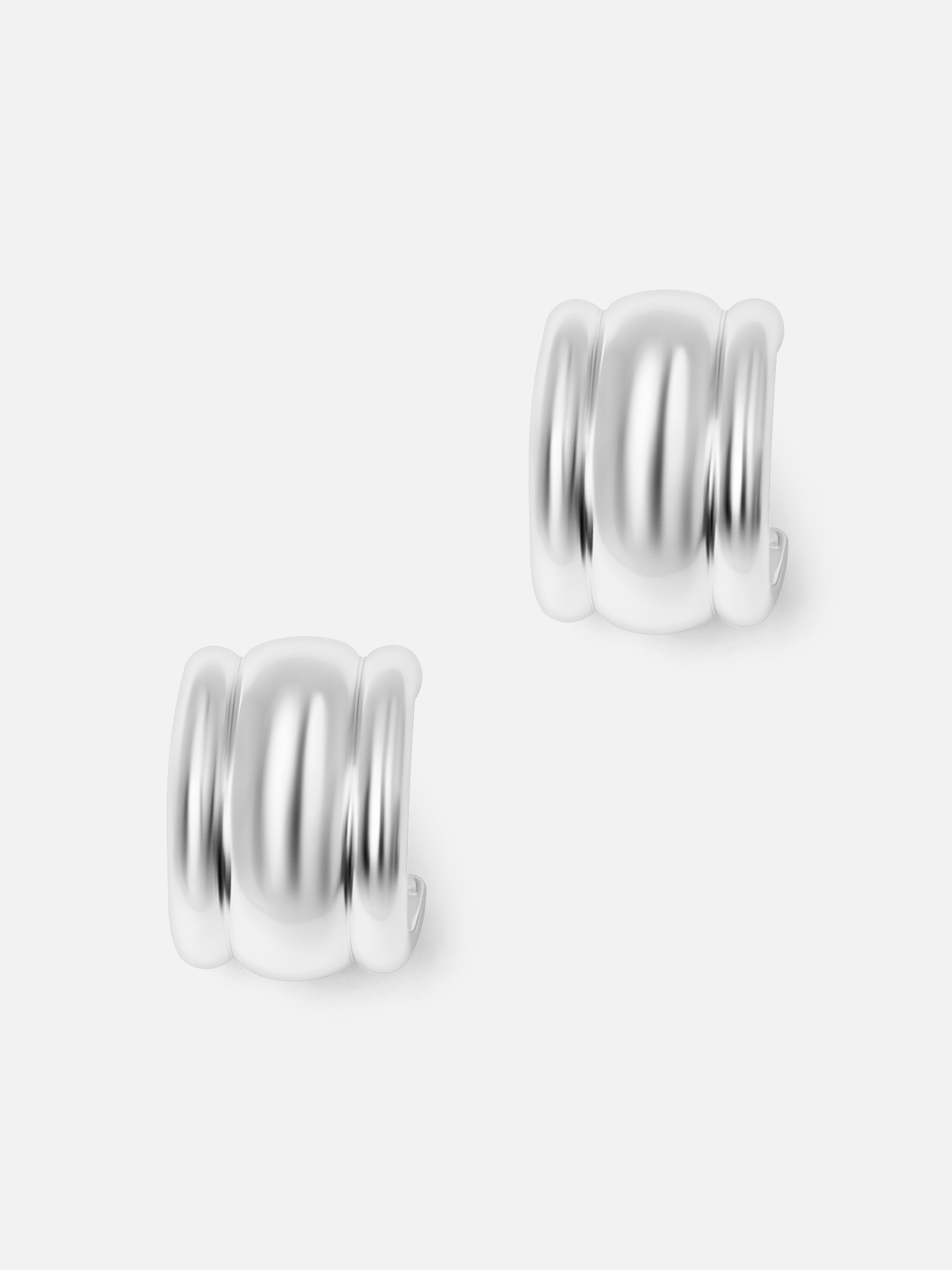 Half-hoop earrings in textured metal