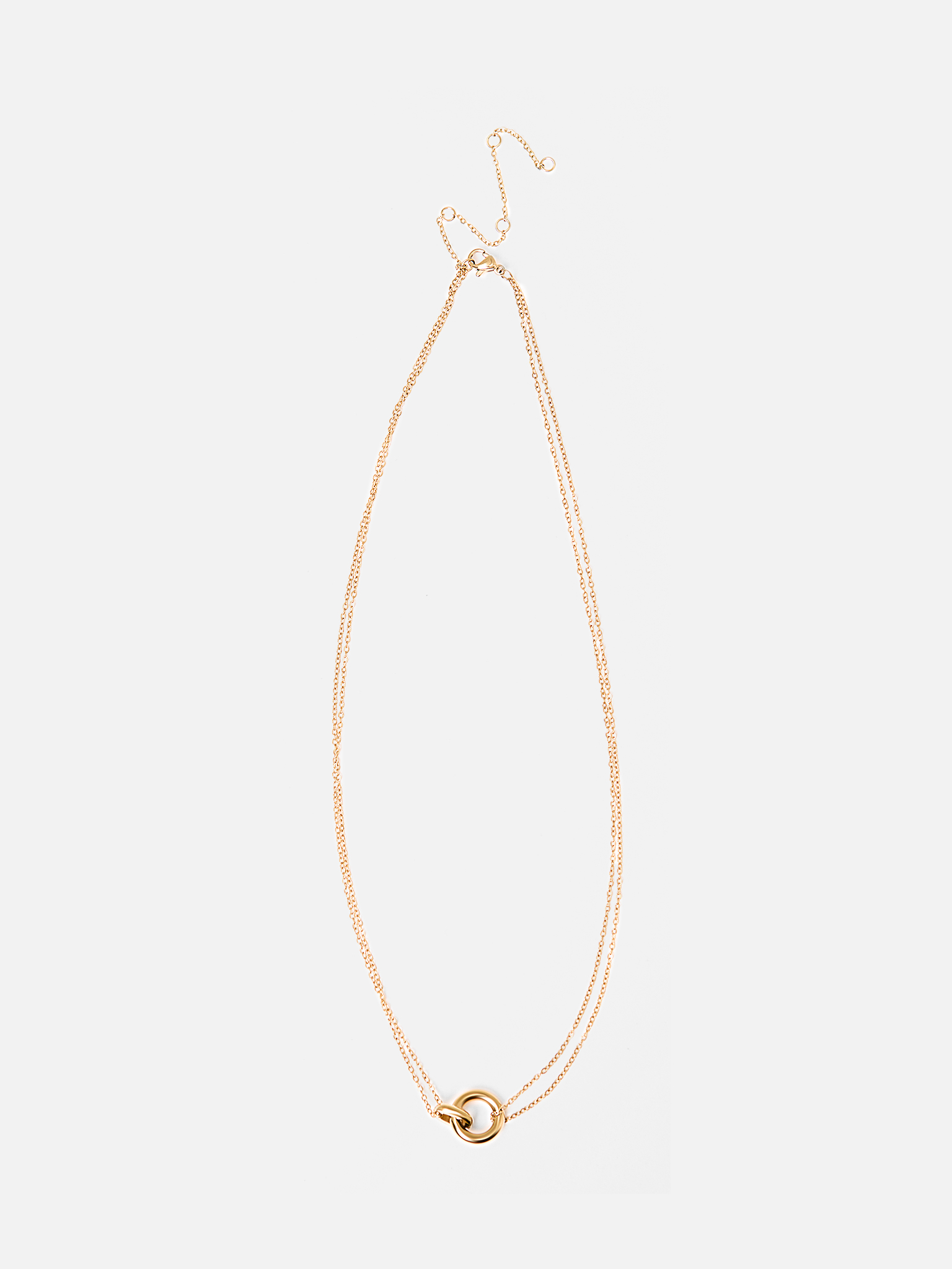 Dual golden chain with a matching pendant