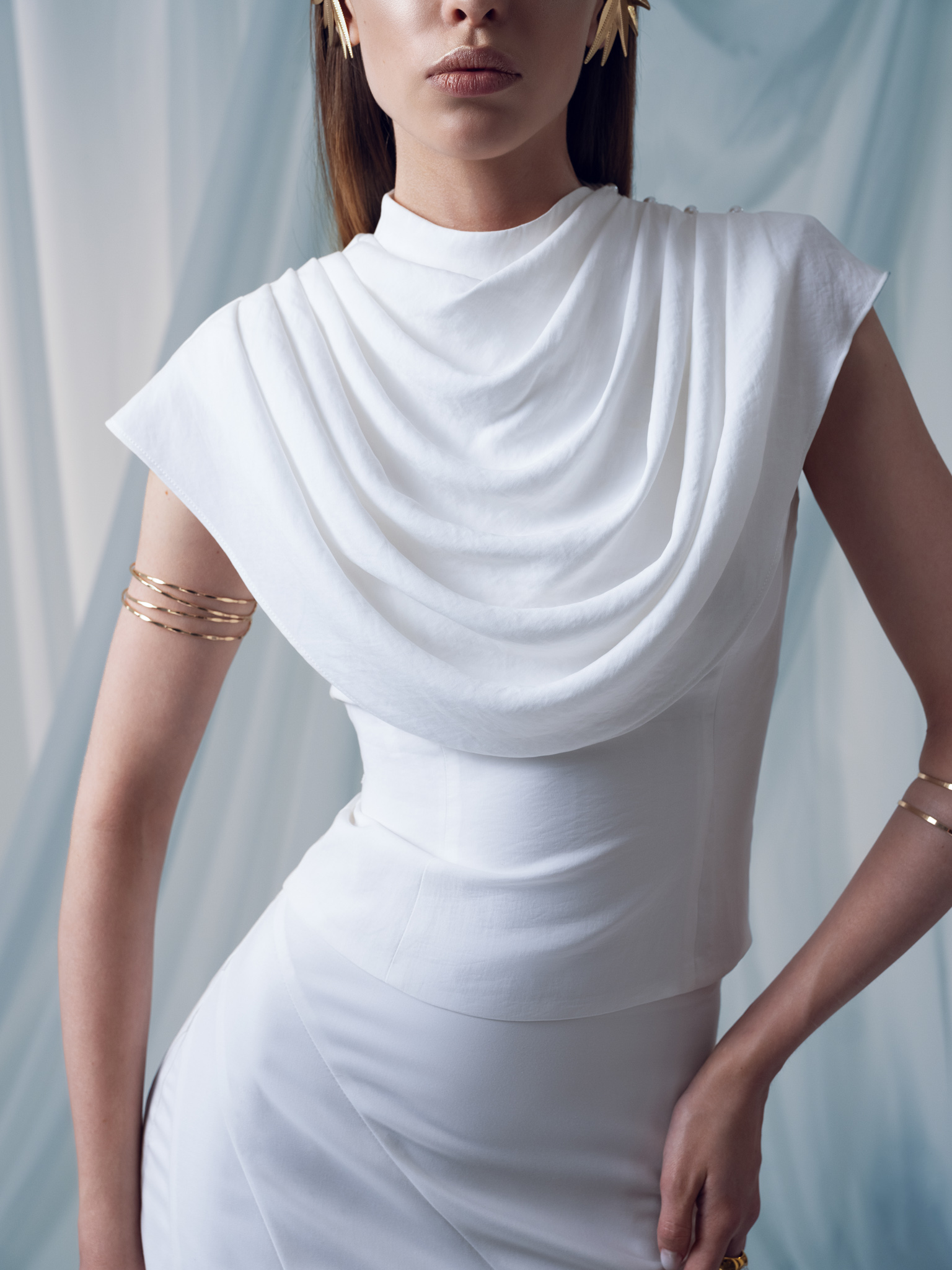 Flared top with draped chest