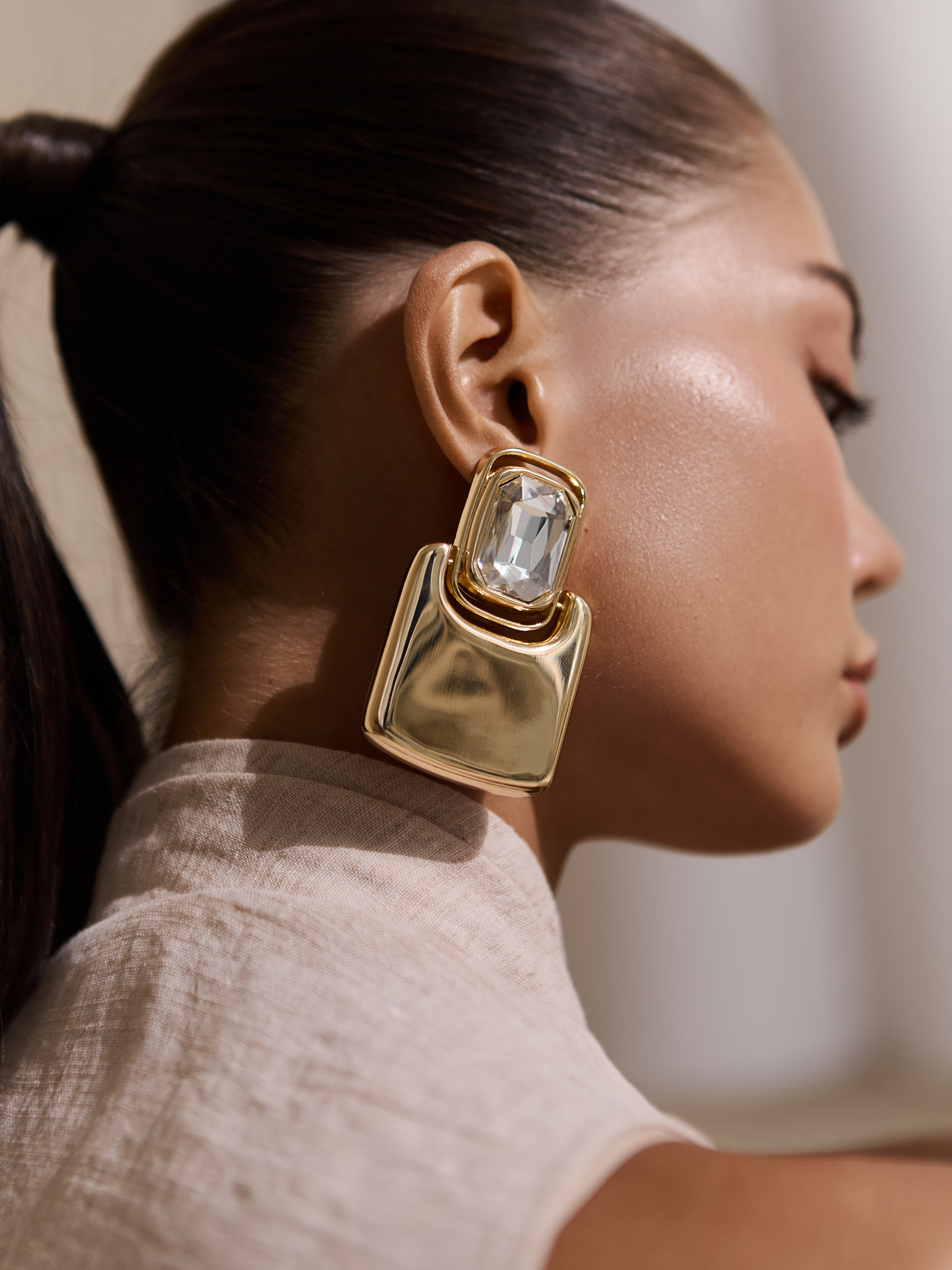 Massive earrings with stones