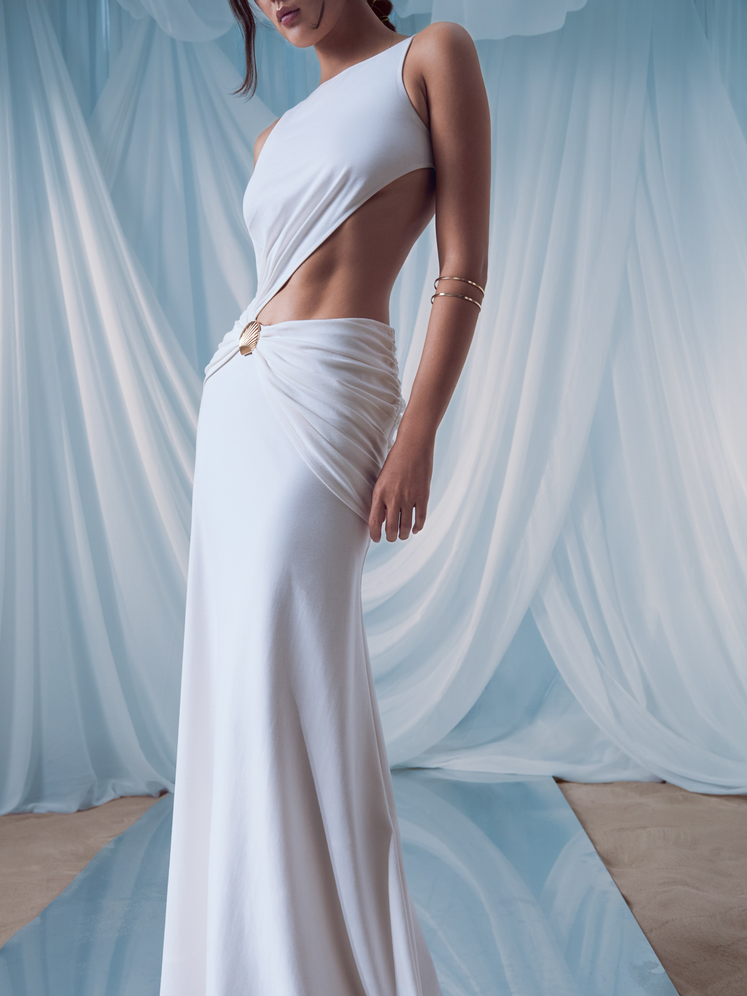 Maxi dress with hip draping and shell decorations