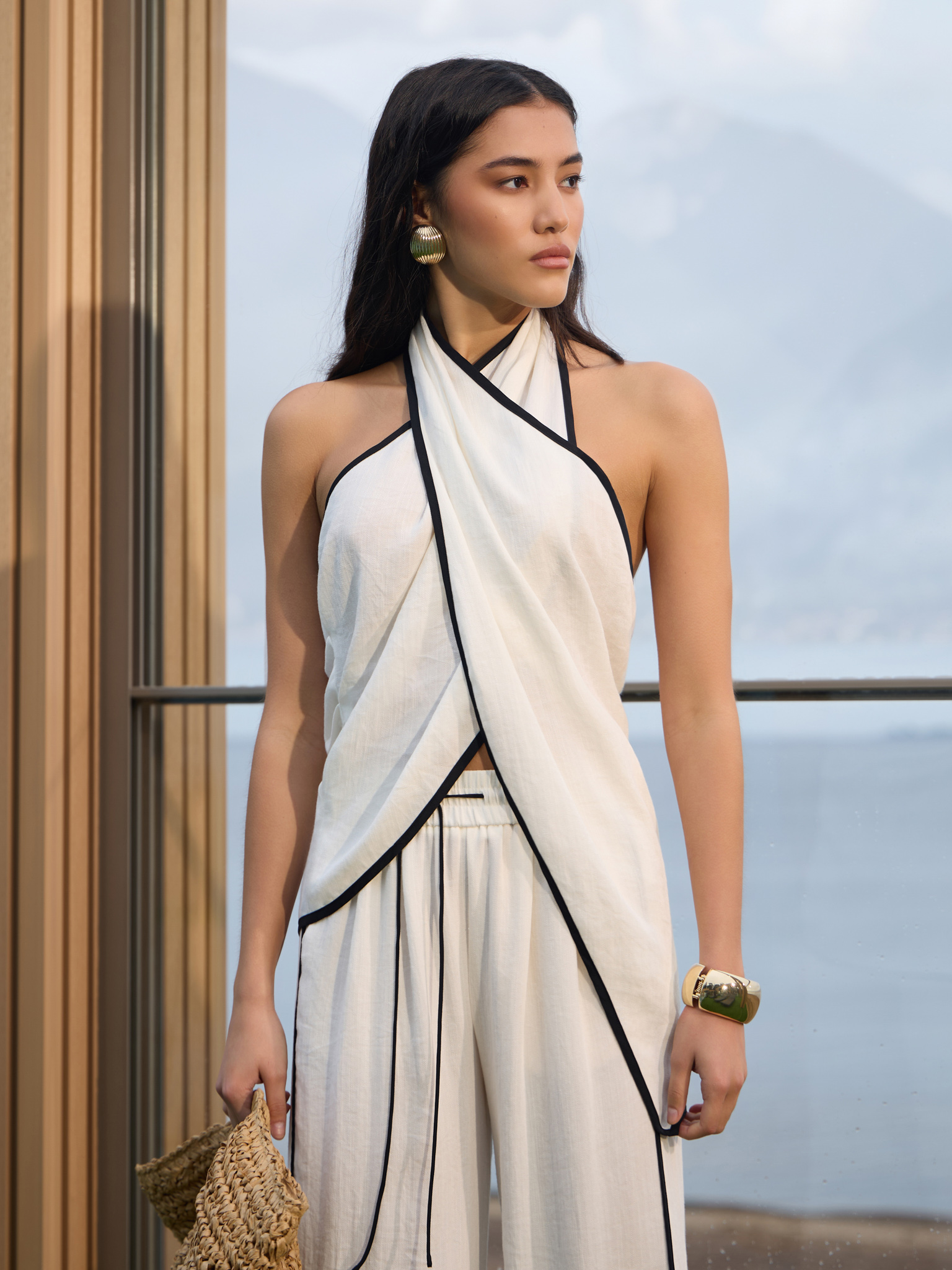 Draped top with halter collar and contrasting edging
