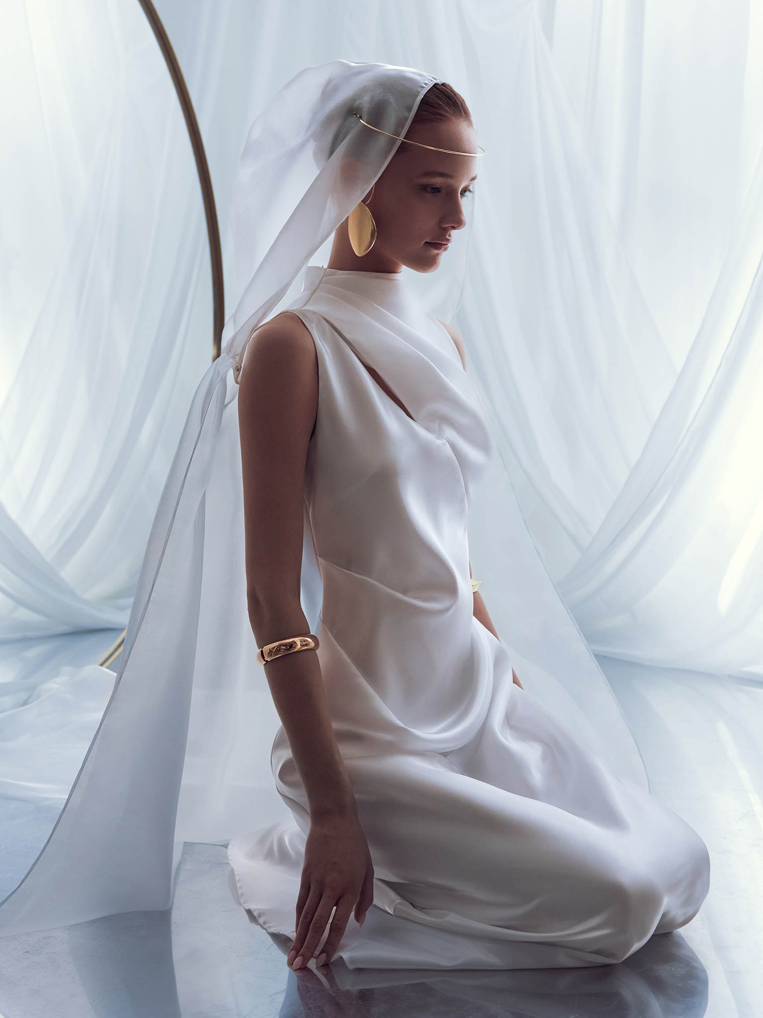 Glossy fabric maxi dress with asymmetrical draperies