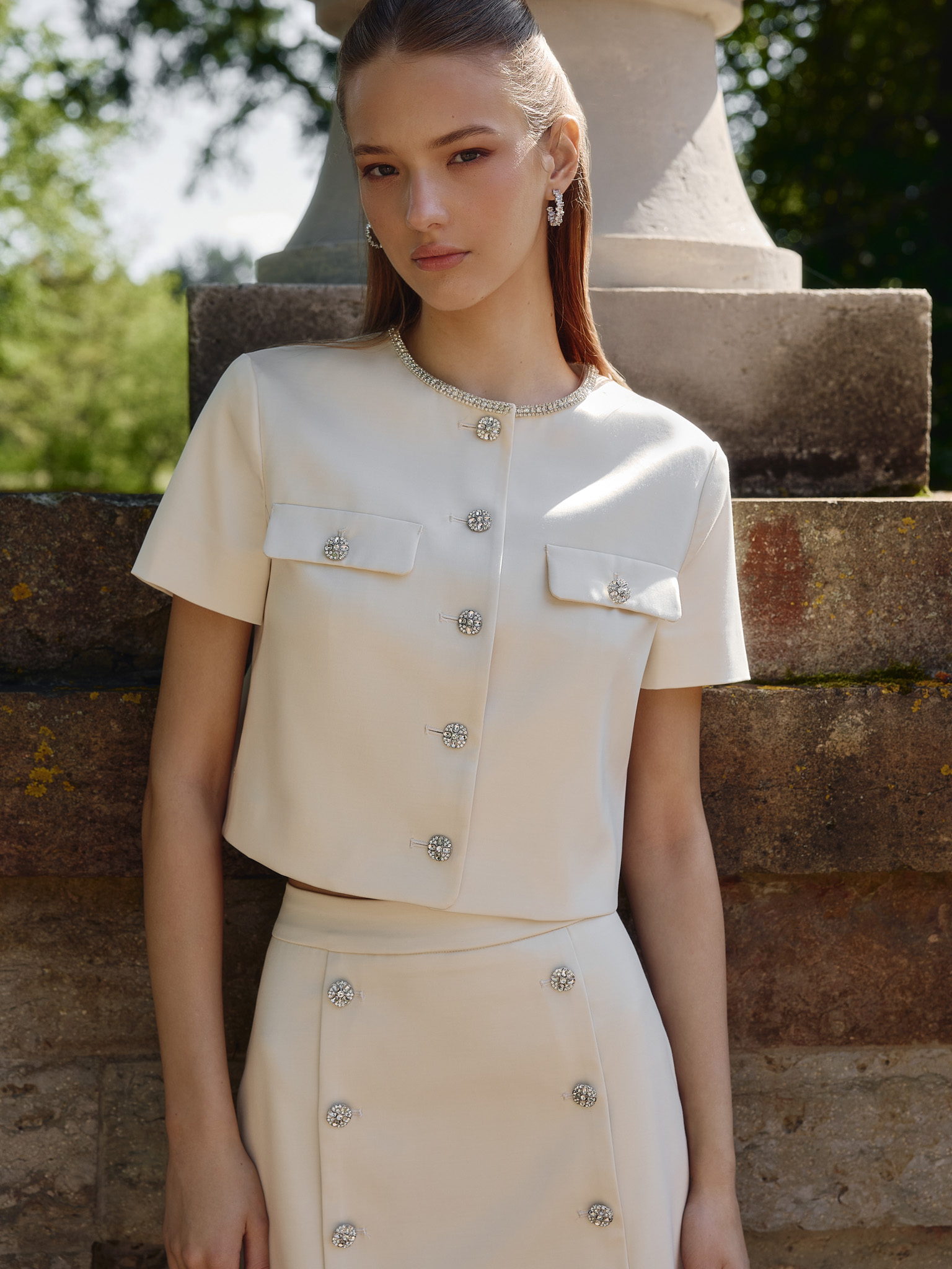 Short sleeved jacket with rhinestone buttons
