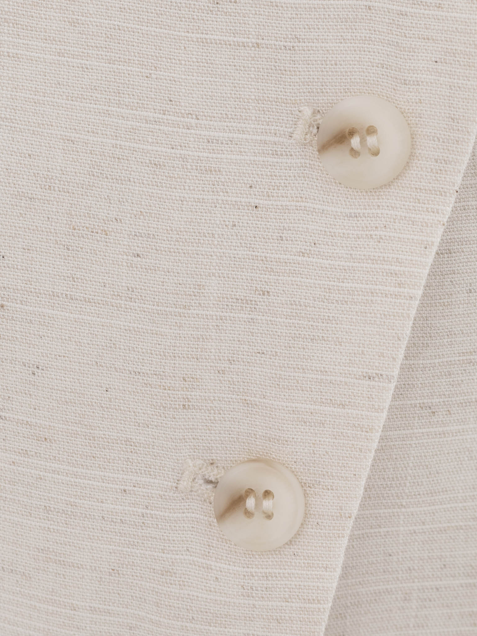 Linen waistcoat with diagonal fastening