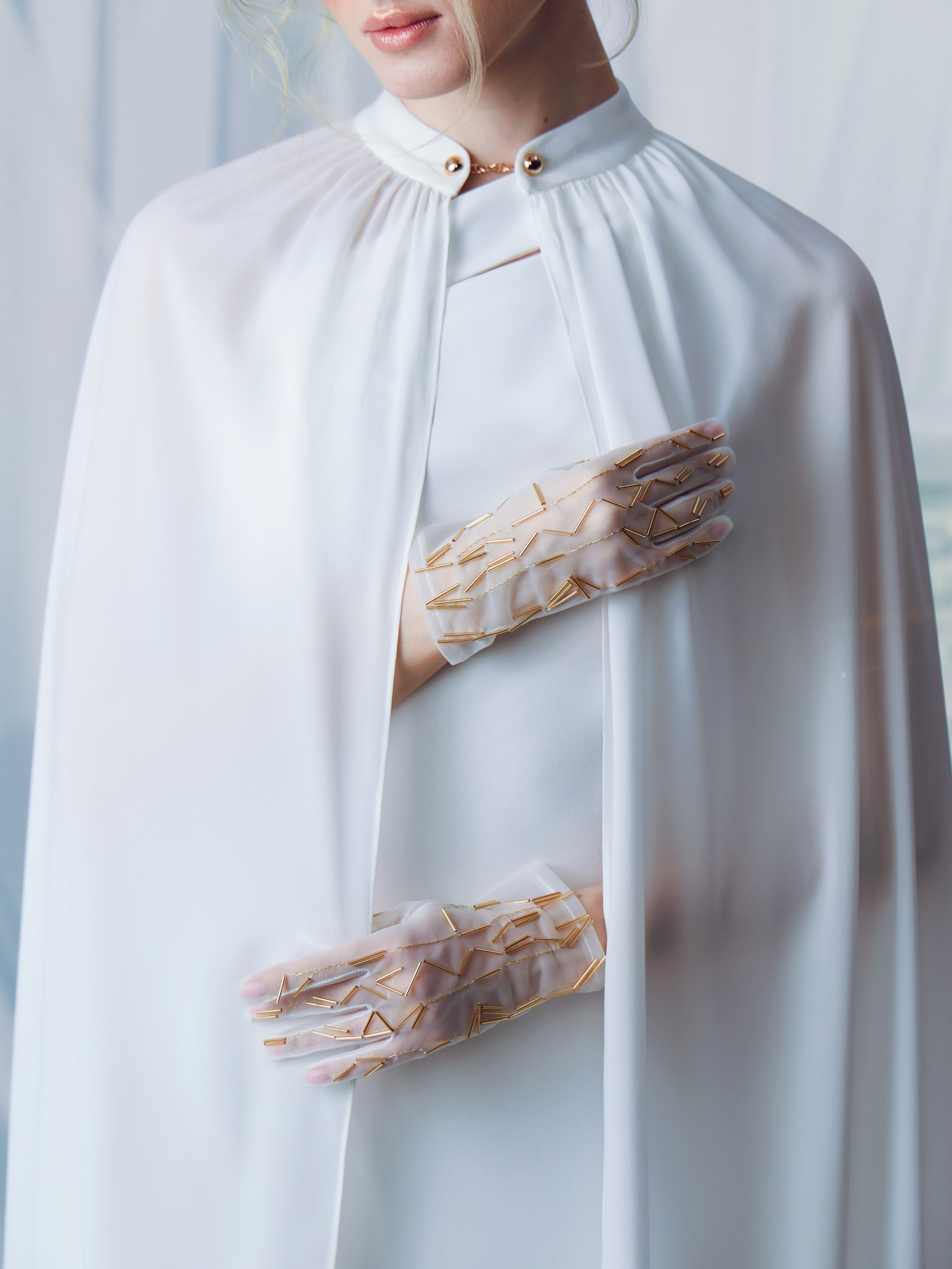 Semi-transparent gloves with golden decorations