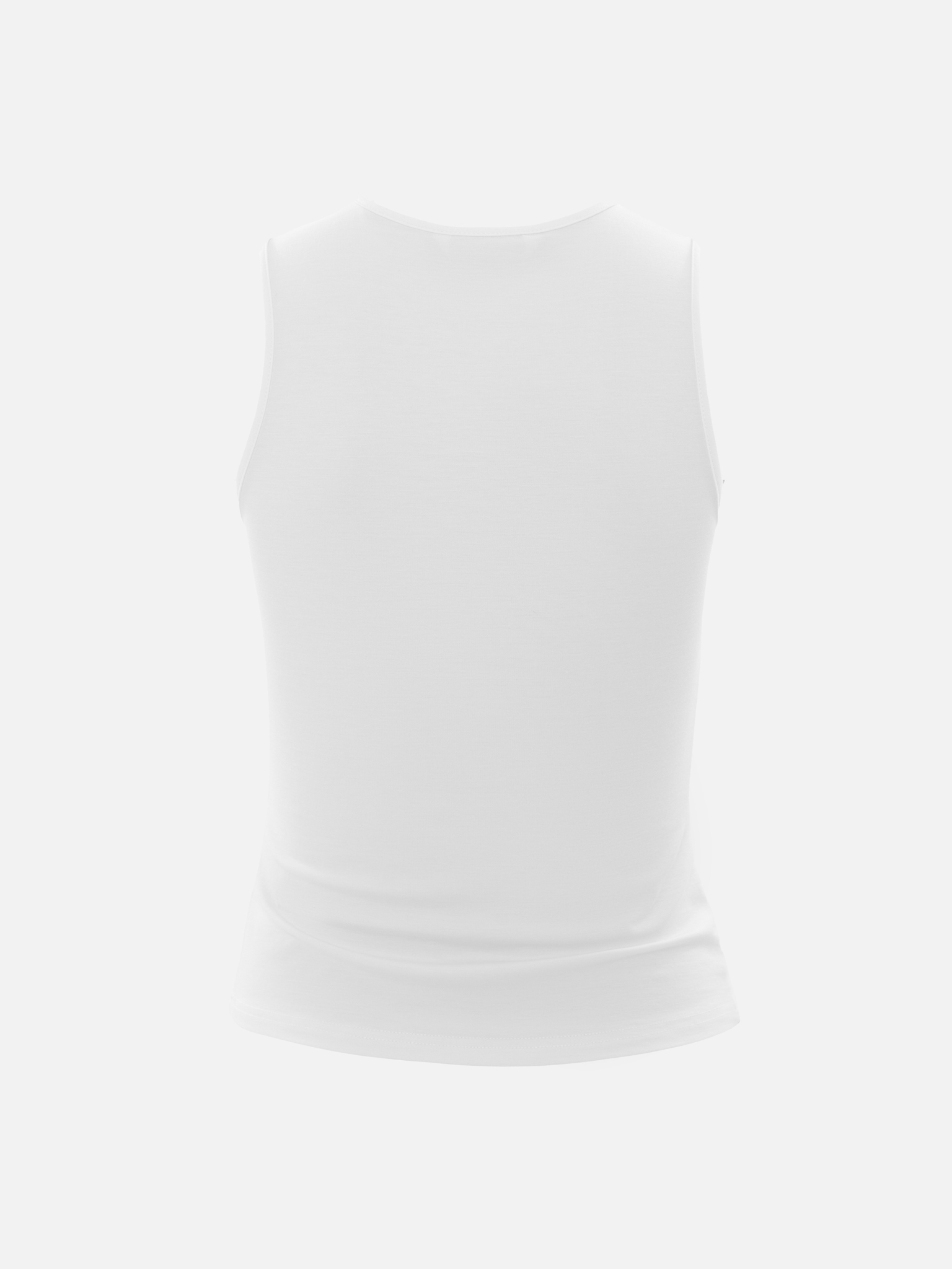 Top avec bretelles asymétriques et décorations métalliques