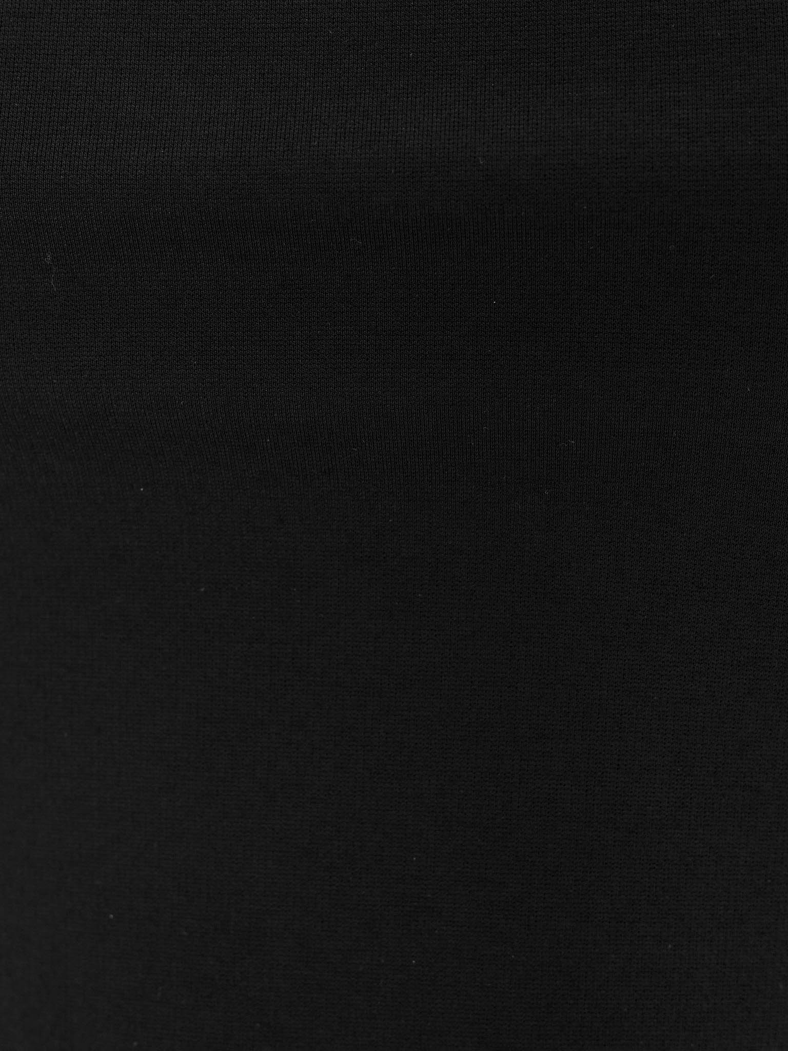 Top with asymmetrical straps and metal decorations