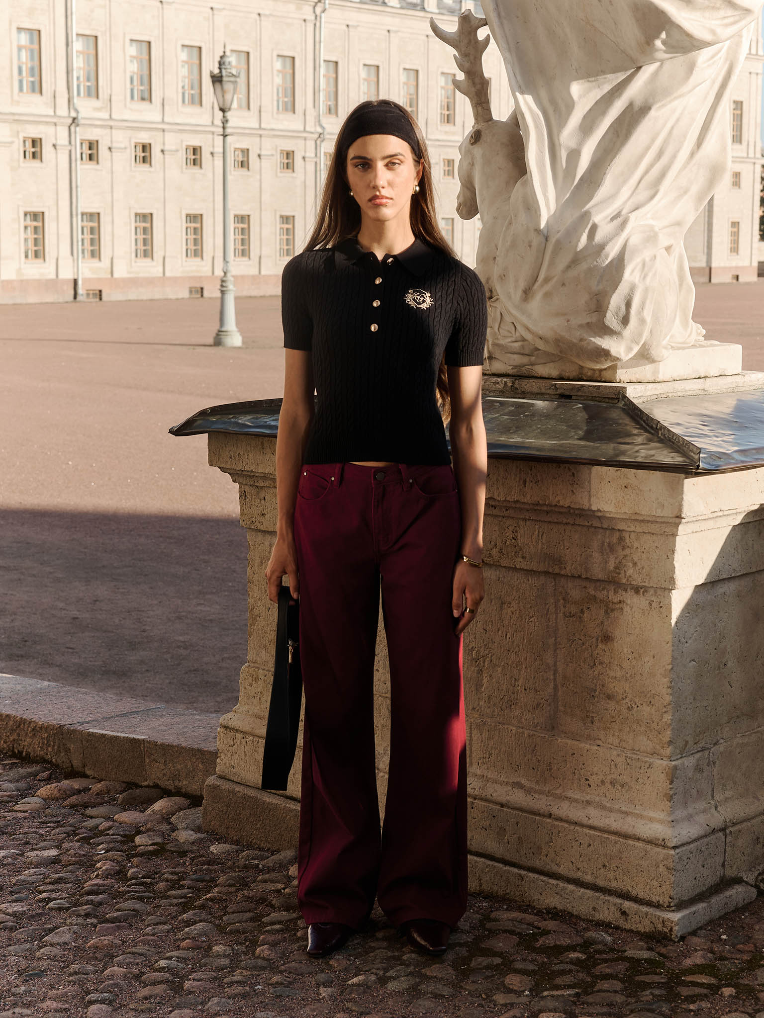 Cable-knit polo with chest embroidery