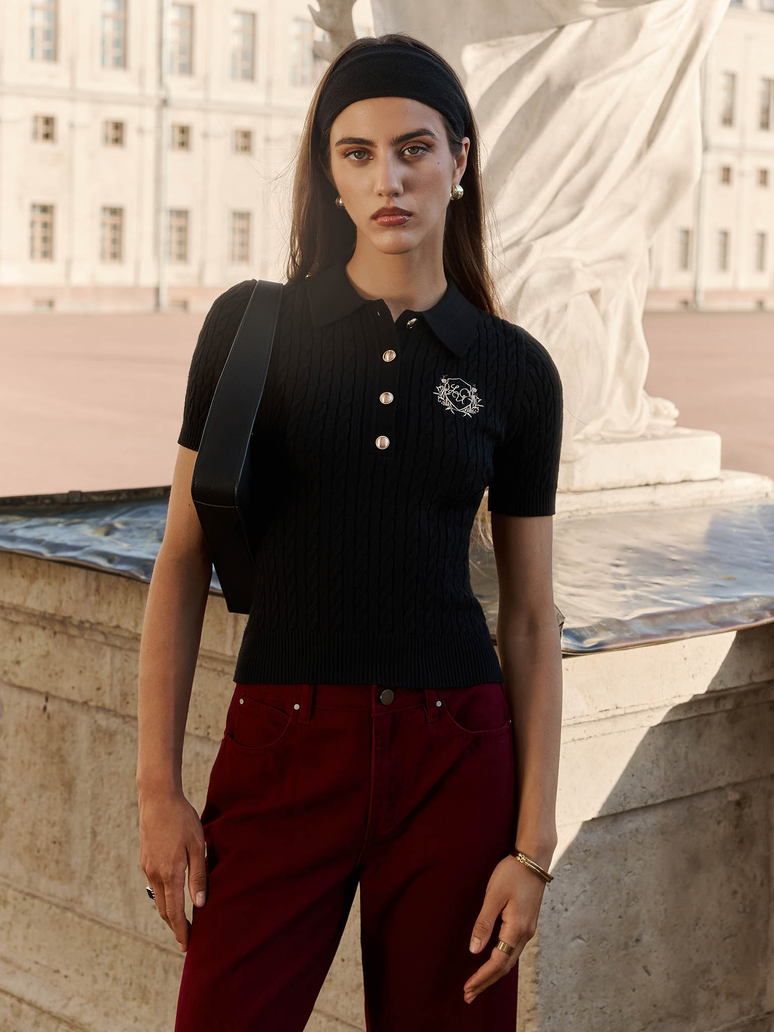 Cable-knit polo with chest embroidery